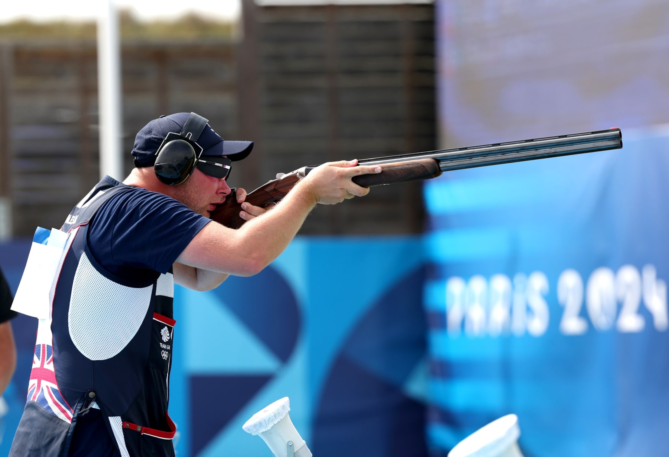 CHATEAUROUX, FRANCE - JULY 30: Nathan Hales of Team Great Britain competes in the Men’s Trap Final on day four of the Olympic Games Paris 2024 at Chateauroux Shooting Centre on July 30, 2024 in Chateauroux, France. (Photo by Charles McQuillan/Getty Images)