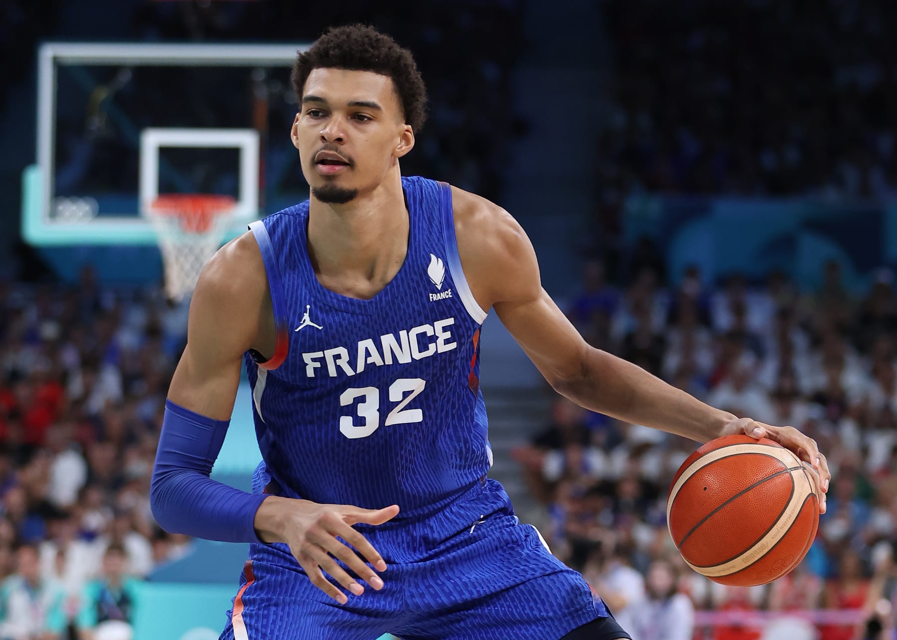 LILLE, FRANCE - JULY 30: Victor Wembanyama #32 of Team France dribbles during a Men's Group Phase-Group B match between Japan and France on day four of the Olympic Games Paris 2024 at Stade Pierre Mauroy on July 30, 2024 in Lille, France. (Photo by Gregory Shamus/Getty Images)