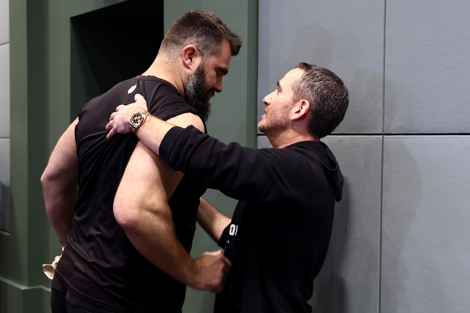 PHILADELPHIA, PENNSYLVANIA - MARCH 04: Howie Roseman, executive vice president of the Philadelphia Eagles, and Jason Kelce shake hands following Kelce's retirement annoucement from the NFL at NovaCare Complex on March 04, 2024 in Philadelphia, Pennsylvania. (Photo by Tim Nwachukwu/Getty Images)