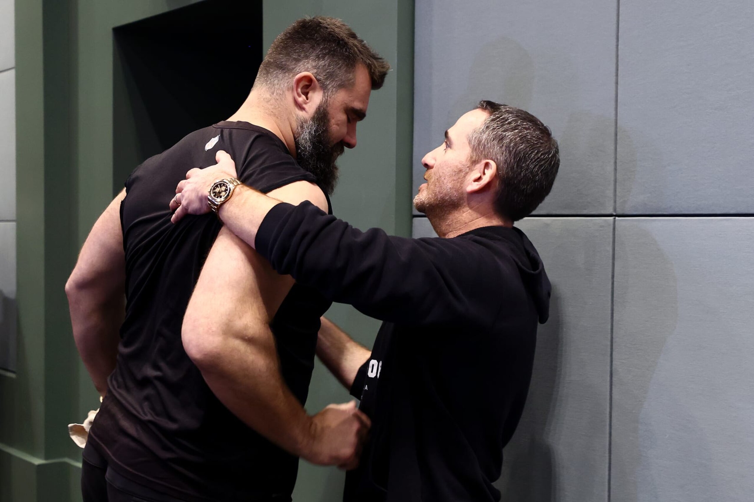 PHILADELPHIA, PENNSYLVANIA - MARCH 04: Howie Roseman, executive vice president of the Philadelphia Eagles, and Jason Kelce shake hands following Kelce's retirement annoucement from the NFL at NovaCare Complex on March 04, 2024 in Philadelphia, Pennsylvania. (Photo by Tim Nwachukwu/Getty Images)