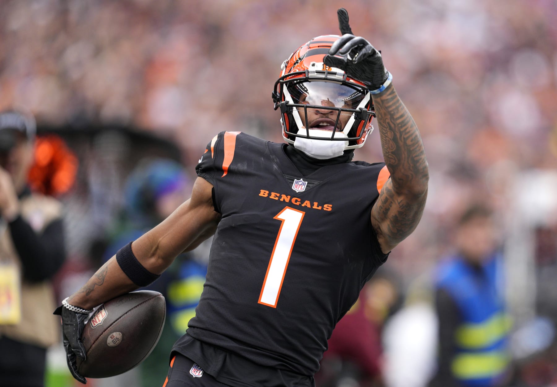 CINCINNATI, OHIO - DECEMBER 16: Ja’Marr Chase #1 of the Cincinnati Bengals reacts after making a reception in the first quarter of the game against the Minnesota Vikings at Paycor Stadium on December 16, 2023 in Cincinnati, Ohio. (Photo by Jeff Dean/Getty Images)