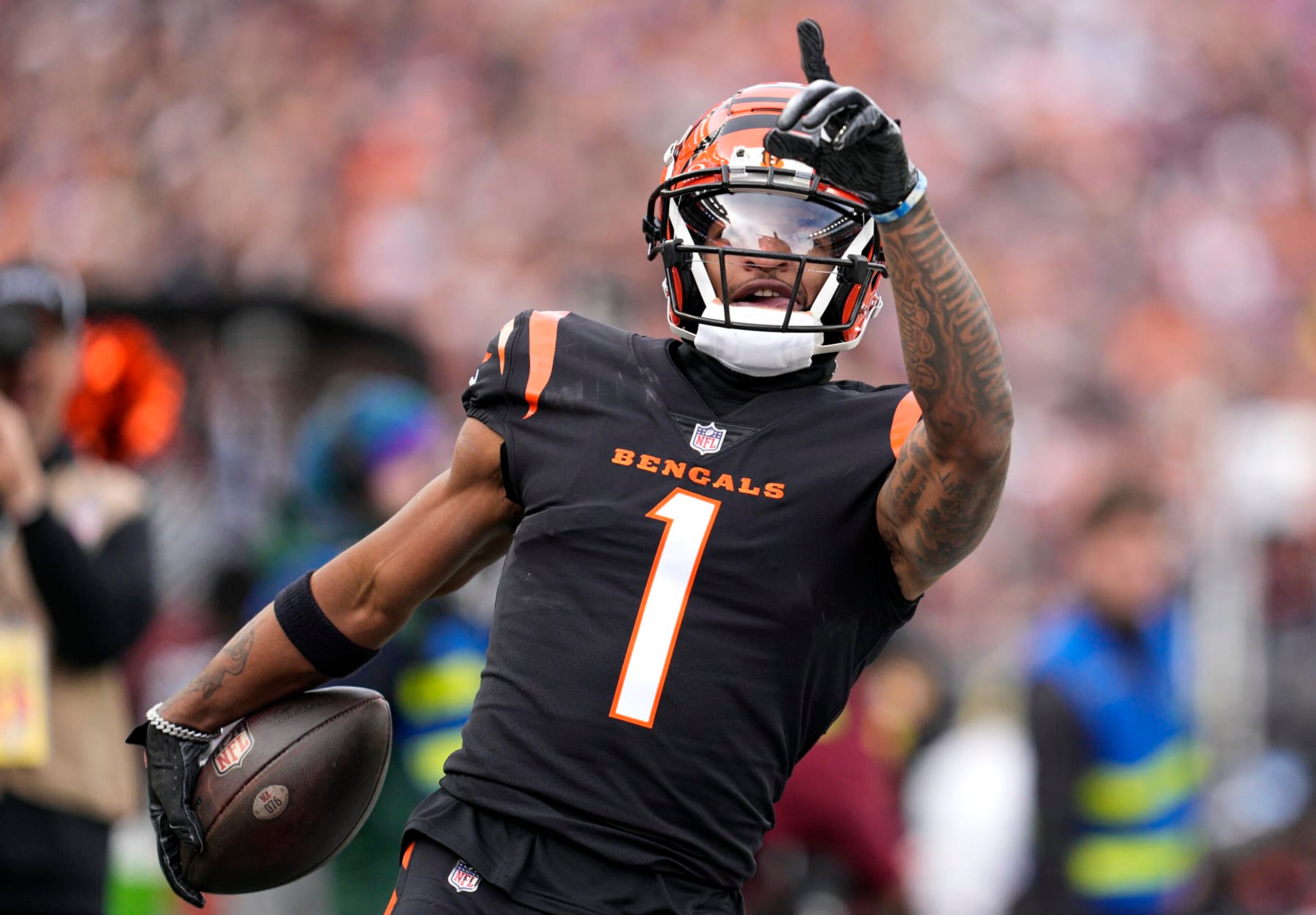 CINCINNATI, OHIO - DECEMBER 16: Ja’Marr Chase #1 of the Cincinnati Bengals reacts after making a reception in the first quarter of the game against the Minnesota Vikings at Paycor Stadium on December 16, 2023 in Cincinnati, Ohio. (Photo by Jeff Dean/Getty Images)