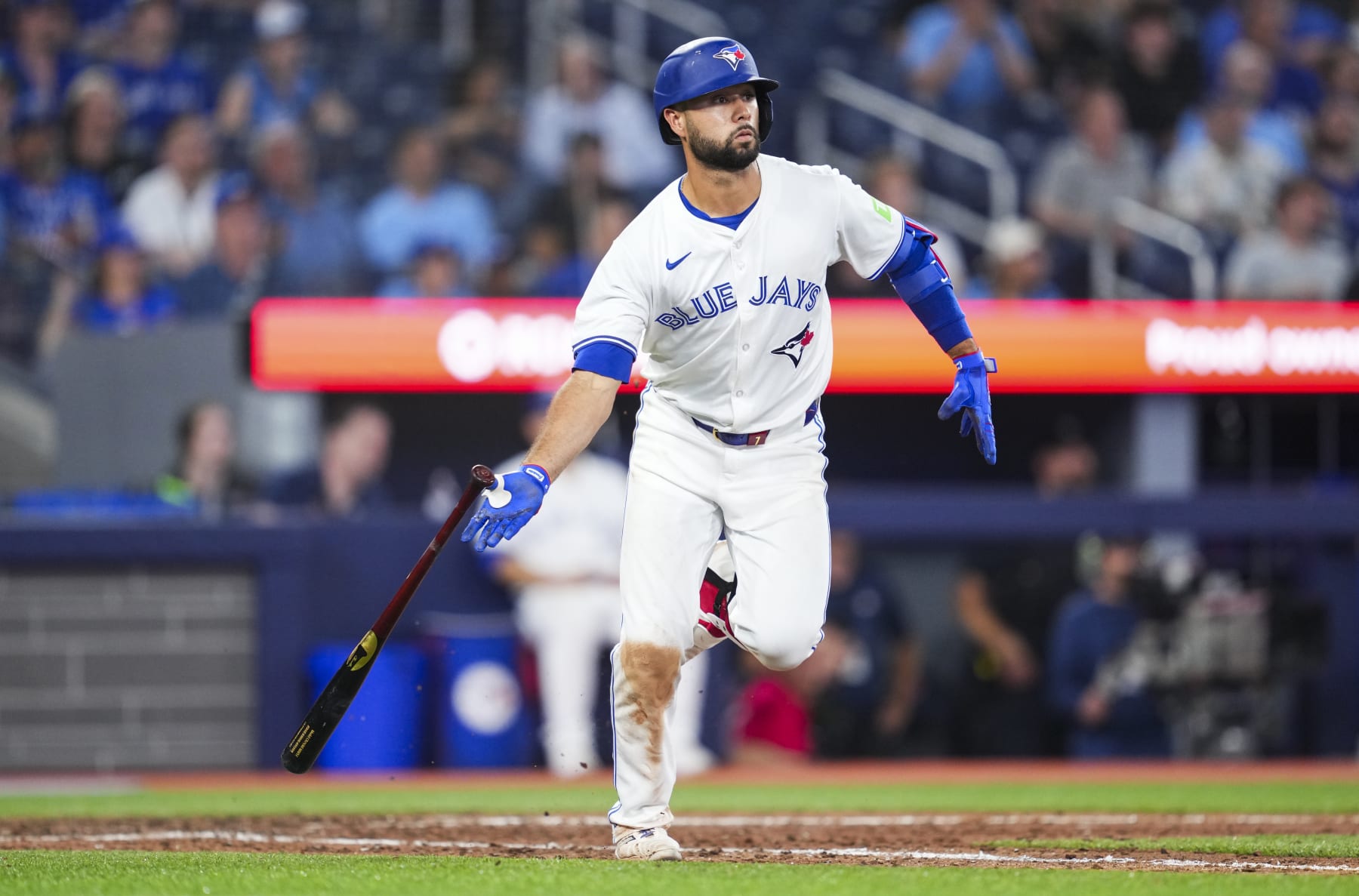 TORONTO, ON - JUNE 18: Isiah Kiner-Falefa #7 of Toronto Blue Jays runs to first base against the Boston Red Sox during the ninth inning in their MLB game at the Rogers Centre on June 18, 2024 in Toronto, Ontario, Canada. (Photo by Mark Blinch/Getty Images)