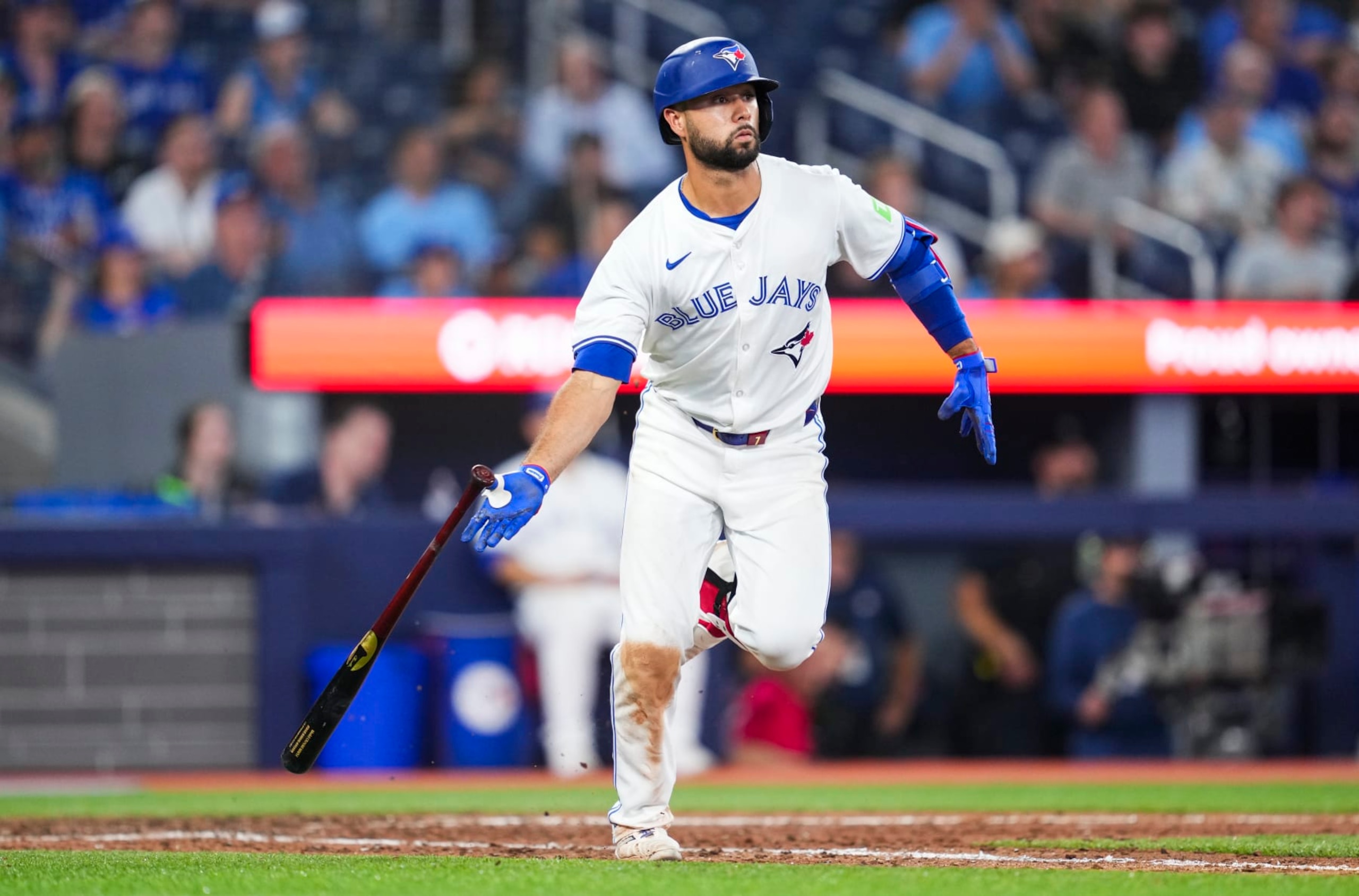 TORONTO, ON - JUNE 18: Isiah Kiner-Falefa #7 of Toronto Blue Jays runs to first base against the Boston Red Sox during the ninth inning in their MLB game at the Rogers Centre on June 18, 2024 in Toronto, Ontario, Canada. (Photo by Mark Blinch/Getty Images)