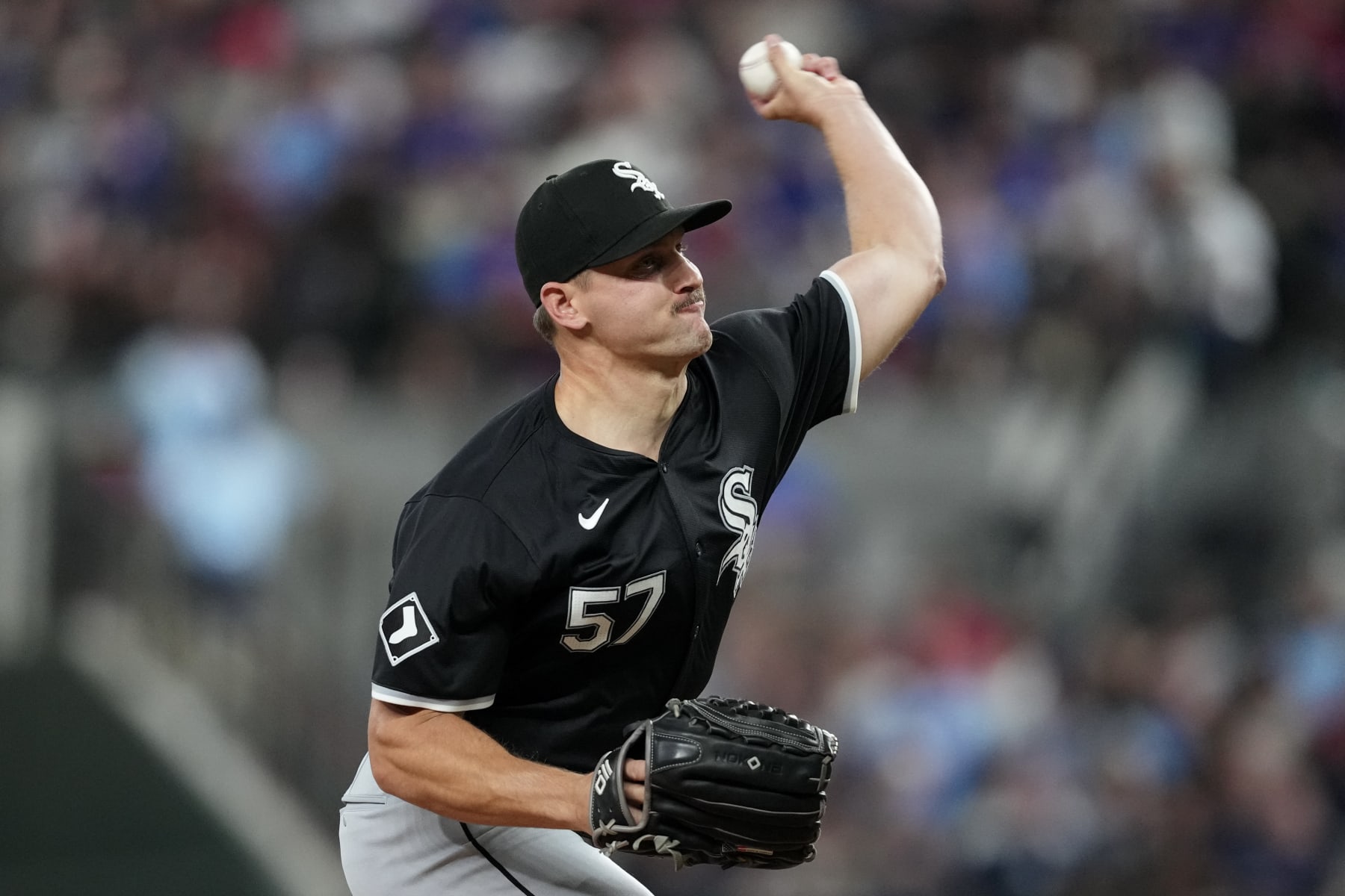 ARLINGTON, TEXAS - JULY 23: Tanner Banks #57 of the Chicago White Sox pitches during the seventh inning against the Texas Rangers at Globe Life Field on July 23, 2024 in Arlington, Texas. (Photo by Sam Hodde/Getty Images)