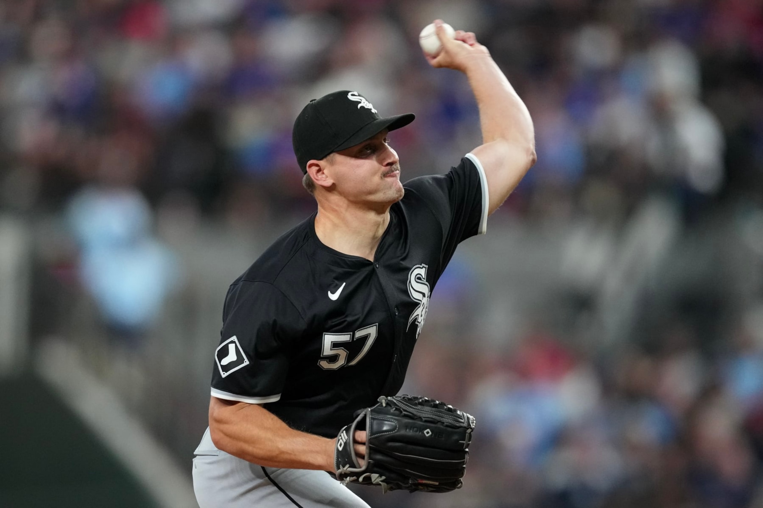 ARLINGTON, TEXAS - JULY 23: Tanner Banks #57 of the Chicago White Sox pitches during the seventh inning against the Texas Rangers at Globe Life Field on July 23, 2024 in Arlington, Texas. (Photo by Sam Hodde/Getty Images)