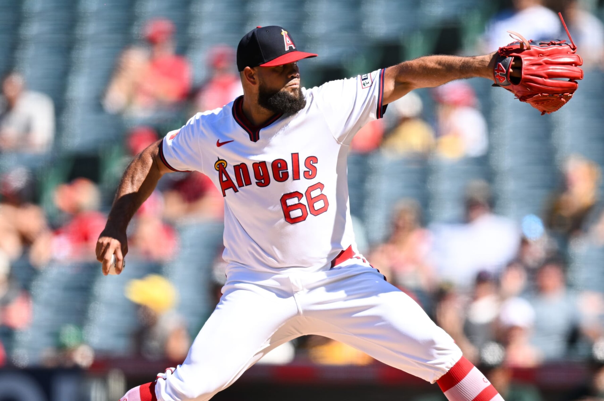 ANAHEIM, CALIFORNIA - JULY 28: Luis García #66 of Los Angeles Angels pitches in the top of the ninth inning during the regular season game against the Oakland Athletics at Angel Stadium of Anaheim on July 28, 2024 in Anaheim, California. (Photo by Gene Wang/Getty Images)