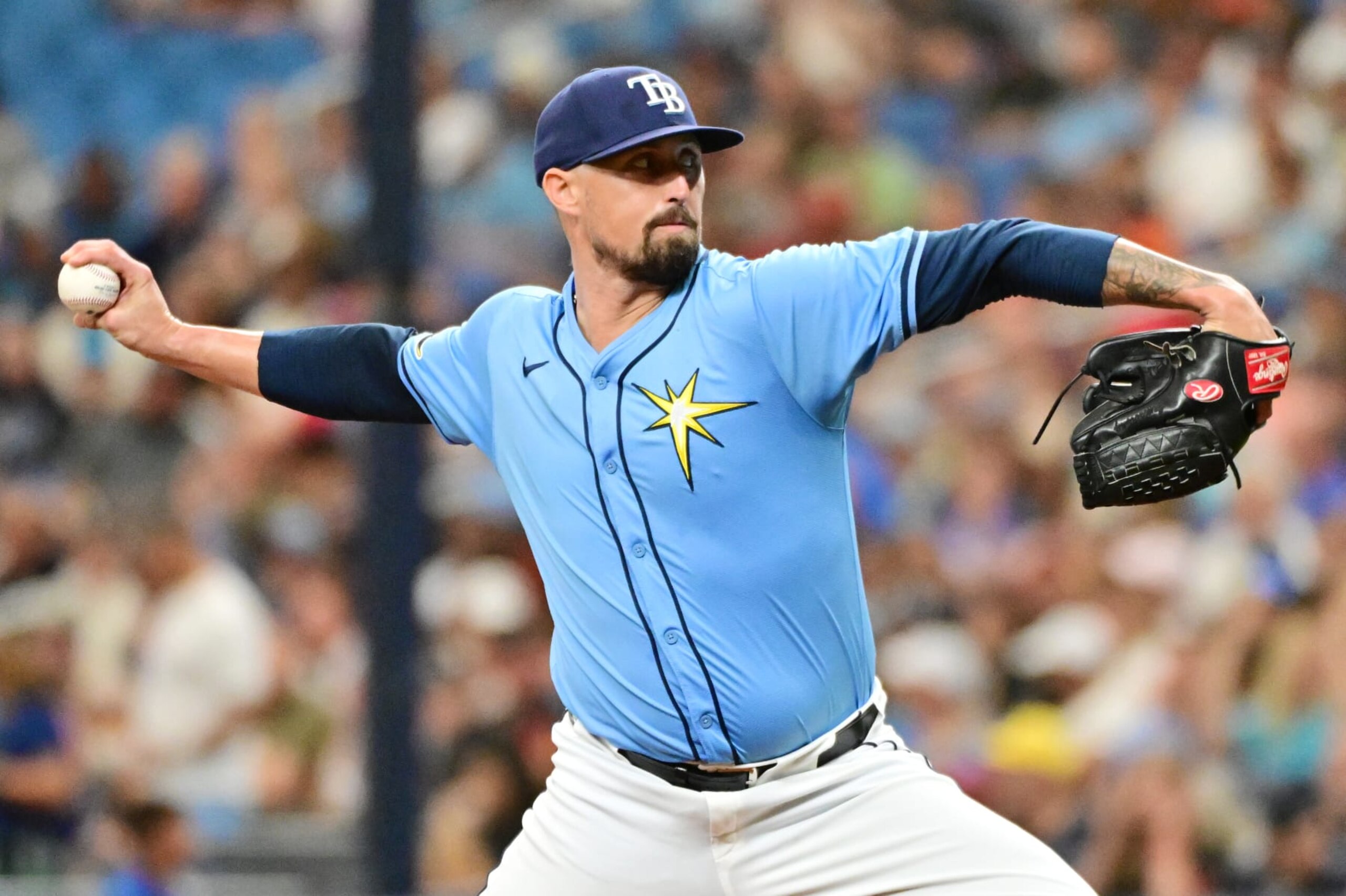 ST PETERSBURG, FLORIDA - JULY 28: Shawn Armstrong #64 of the Tampa Bay Rays delivers a pitch to the Cincinnati Reds in the second inning at Tropicana Field on July 28, 2024 in St Petersburg, Florida. (Photo by Julio Aguilar/Getty Images)