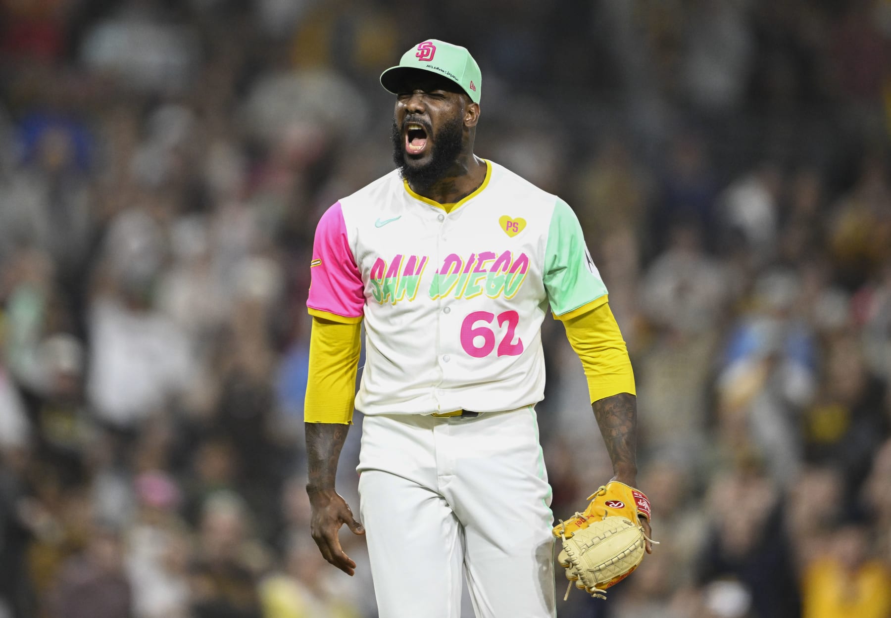 SAN DIEGO, CA - JUNE 21:  Enyel De Los Santos #62 of the San Diego Padres reacts after the Padres beat the Milwaukee Brewers 9-5 in a baseball game June 21, 2024 at Petco Park in San Diego, California. (Photo by Denis Poroy/Getty Images)