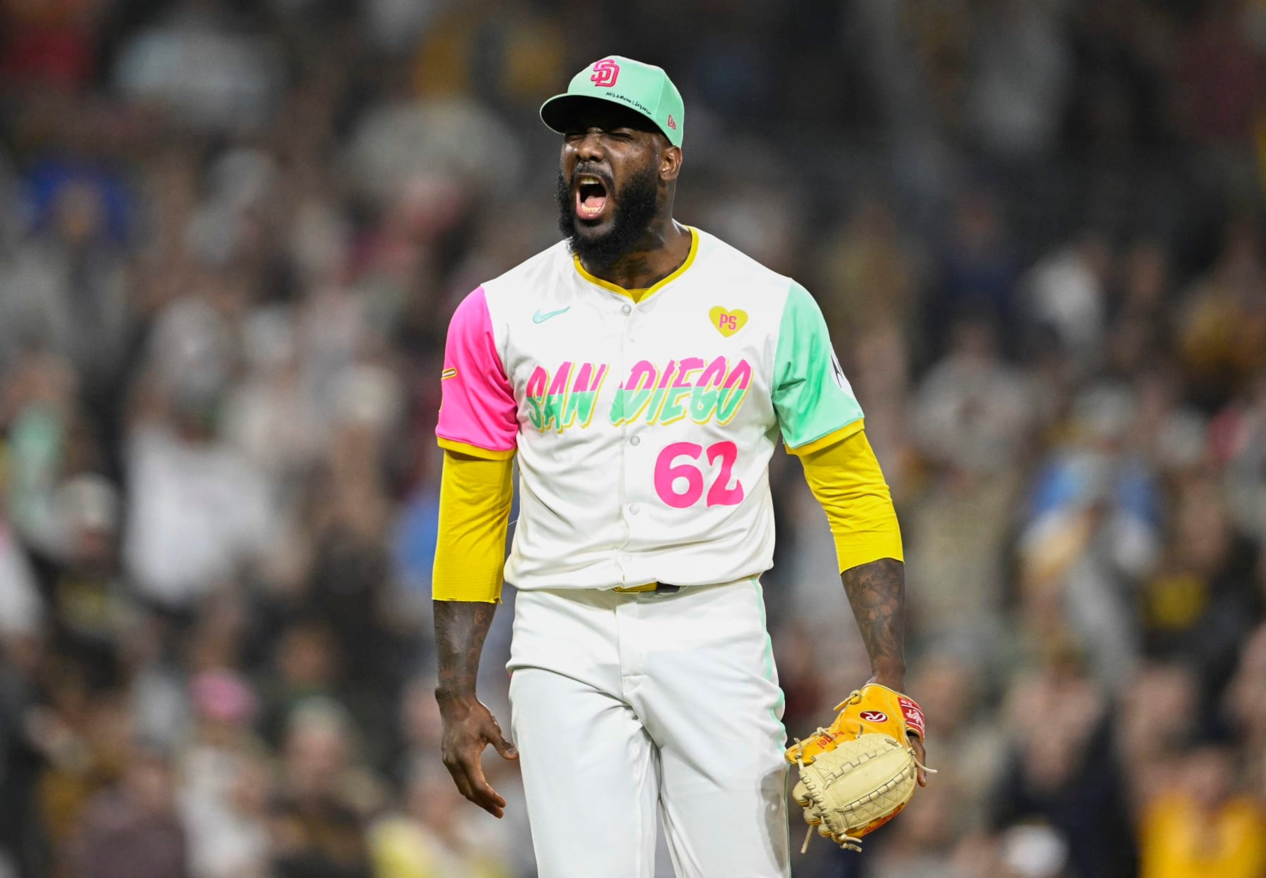 SAN DIEGO, CA - JUNE 21:  Enyel De Los Santos #62 of the San Diego Padres reacts after the Padres beat the Milwaukee Brewers 9-5 in a baseball game June 21, 2024 at Petco Park in San Diego, California. (Photo by Denis Poroy/Getty Images)