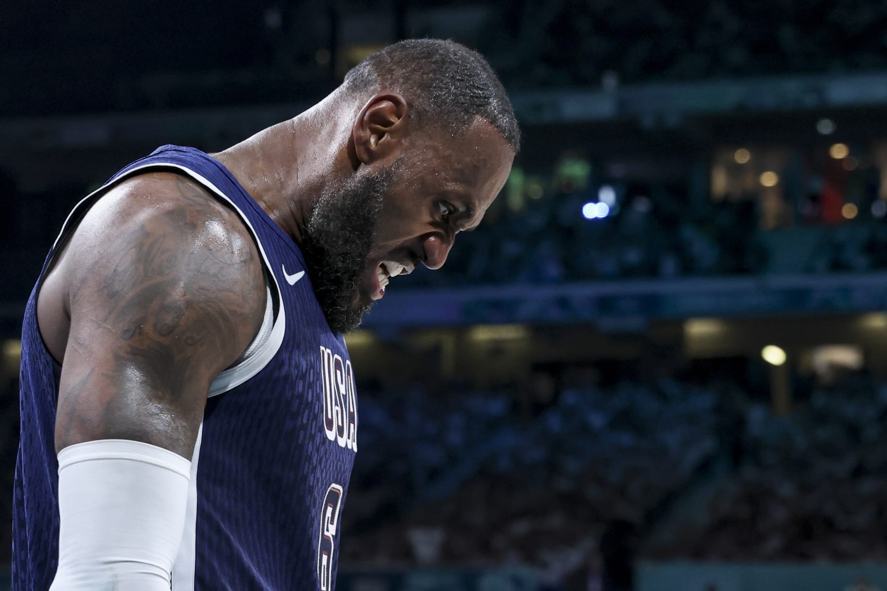 LILLE, FRANCE - JULY 28: LeBron James #6 of Team USA reacts to a play during the Men's Group Phase - Group C match between Serbia and USA on Day 2 of the Olympic Games Paris 2024 at Stade Pierre Mauroy on July 28, 2024 in Lille, France. (Photo by Catherine Steenkeste/Getty Images)
