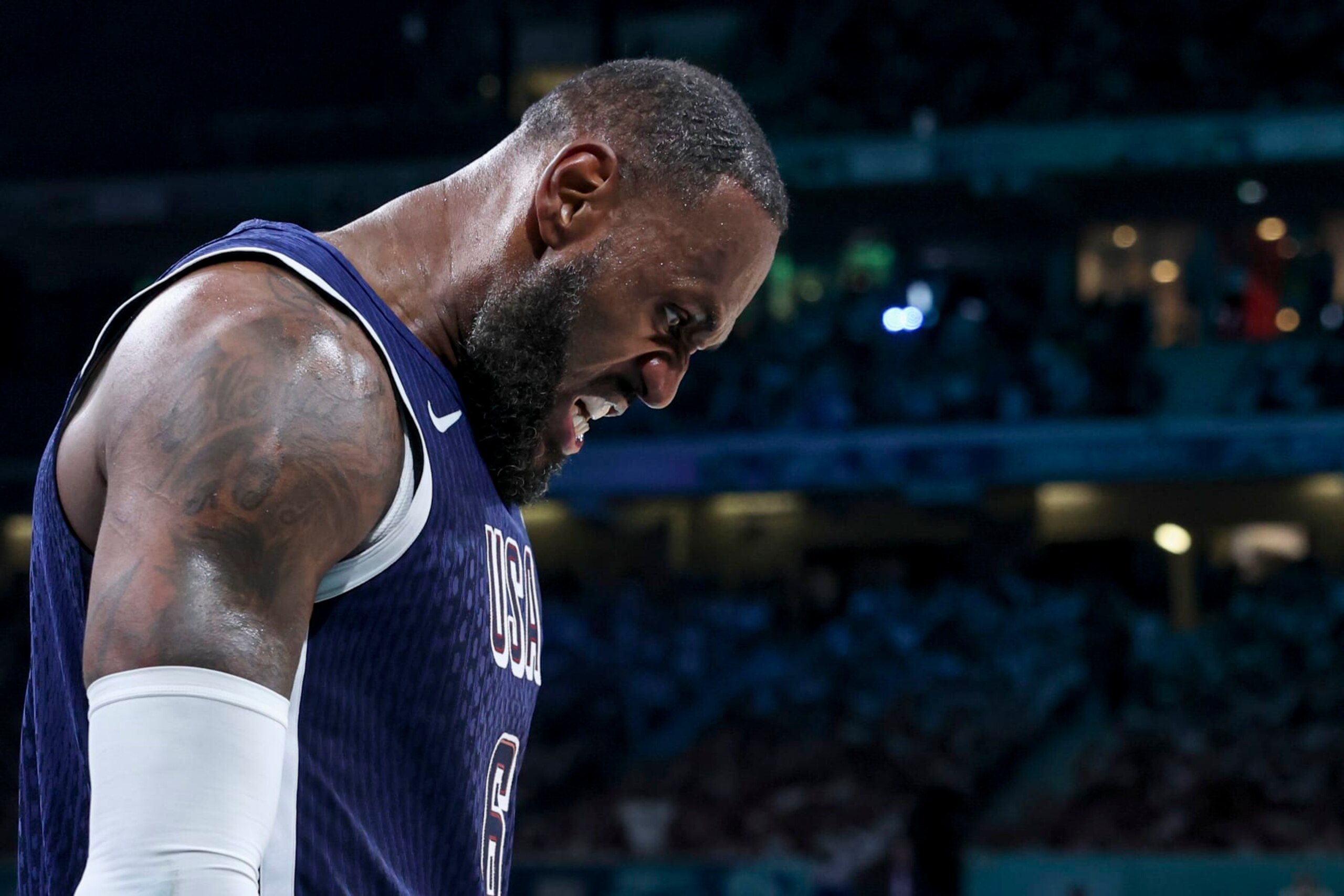 LILLE, FRANCE - JULY 28: LeBron James #6 of Team USA reacts to a play during the Men's Group Phase - Group C match between Serbia and USA on Day 2 of the Olympic Games Paris 2024 at Stade Pierre Mauroy on July 28, 2024 in Lille, France. (Photo by Catherine Steenkeste/Getty Images)