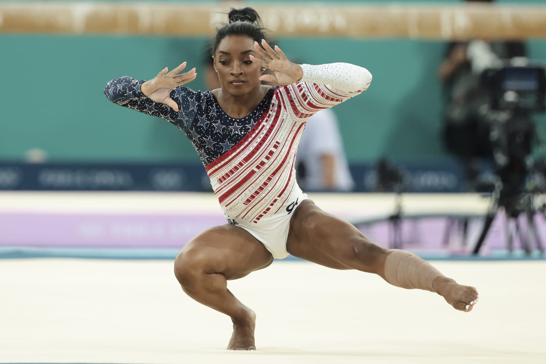 PARIS, FRANCE - JULY 30: Simone Biles of Team United States competes on the Floor during the Artistic Gymnastics Women's Team Final on day four of the Olympic Games Paris 2024 at Bercy Arena on July 30, 2024 in Paris, France. (Photo by Jean Catuffe/Getty Images)
