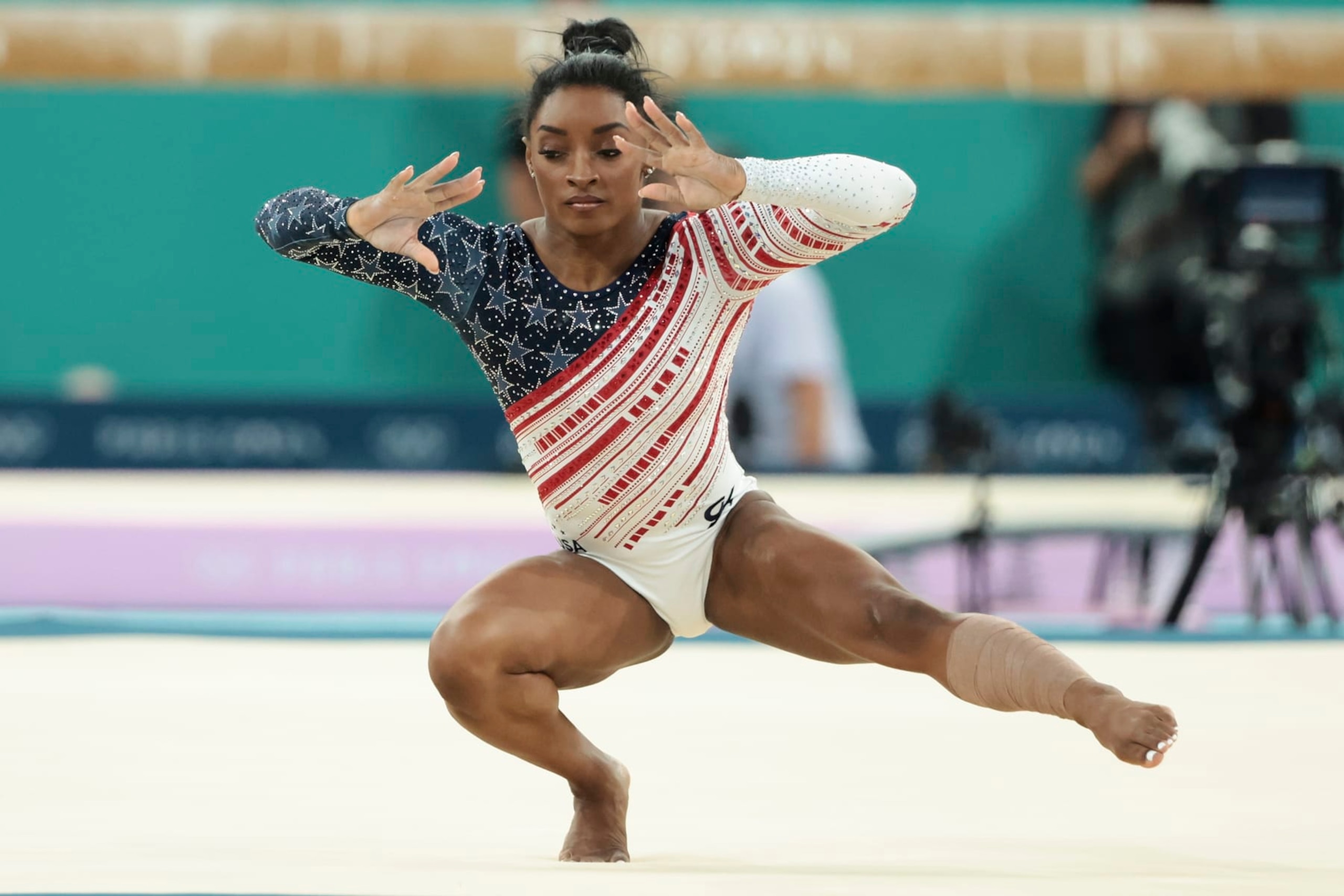 PARIS, FRANCE - JULY 30: Simone Biles of Team United States competes on the Floor during the Artistic Gymnastics Women's Team Final on day four of the Olympic Games Paris 2024 at Bercy Arena on July 30, 2024 in Paris, France. (Photo by Jean Catuffe/Getty Images)