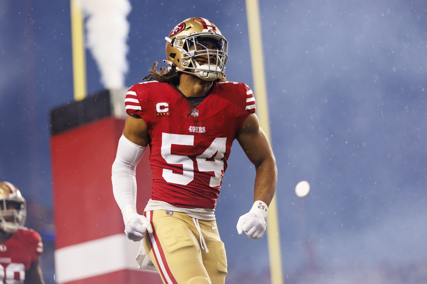 SANTA CLARA, CALIFORNIA - JANUARY 20: Fred Warner #54 of the San Francisco 49ers celebrates as he runs onto the field during team entrances before an NFL divisional round playoff football game against the Green Bay Packers at Levi's Stadium on January 20, 2024 in Santa Clara, California. (Photo by Ryan Kang/Getty Images) SANTA CLARA, CALIFORNIA - JANUARY 20: Fred Warner #54 of the San Francisco 49ers celebrates as he runs onto the field during team entrances before an NFL divisional round playoff football game against the Green Bay Packers at Levi's Stadium on January 20, 2024 in Santa Clara, California. (Photo by Ryan Kang/Getty Images)