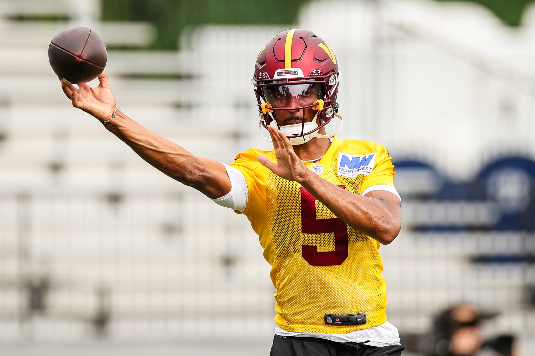 ASHBURN, VA - JULY 25: Jayden Daniels #5 of the Washington Commanders participates in a drill during training camp at OrthoVirginia Training Center at Commanders Park on July 25, 2024 in Ashburn, Virginia. (Photo by Scott Taetsch/Getty Images)