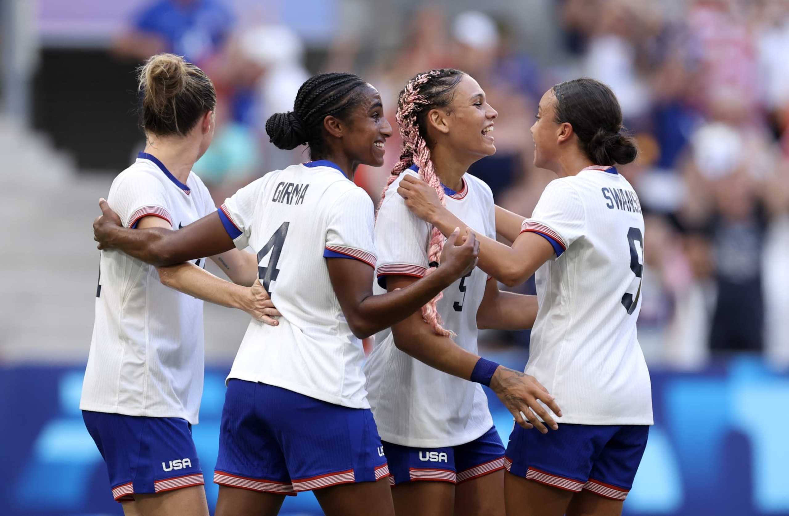 MARSEILLE, FRANCE - JULY 31: Trinity Rodman #5 of Team United States celebrates with teammates after scoring her team's first goal during the Women's group B match between Australia and United States during the Olympic Games Paris 2024 at Stade de Marseille on July 31, 2024 in Marseille, France. (Photo by Alex Livesey/Getty Images)