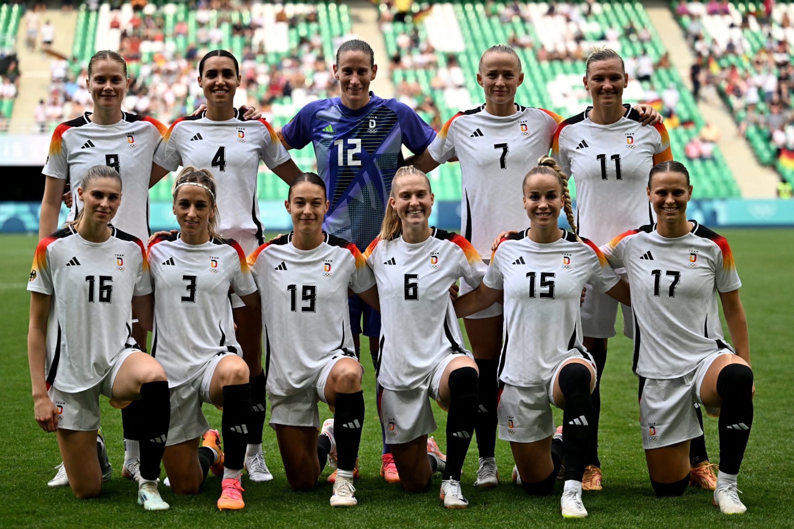 Germany's players pose for a team photo ahead of the women's group B football match between Zambia and Germany during the Paris 2024 Olympic Games at the Geoffroy-Guichard Stadium in Saint-Etienne on July 31, 2024. (Photo by Arnaud FINISTRE / AFP) (Photo by ARNAUD FINISTRE/AFP via Getty Images)