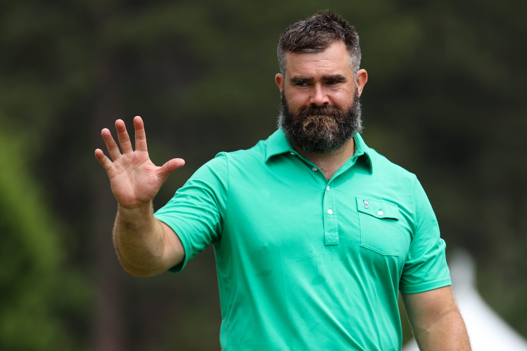 STATELINE, NEVADA - JULY 14: Former NFL football player Jason Kelce waves to fans at the 18th hole on day three of the 2024 American Century Championship at Edgewood Tahoe Golf Course on July 14, 2024 in Stateline, Nevada. (Photo by Isaiah Vazquez/Getty Images)