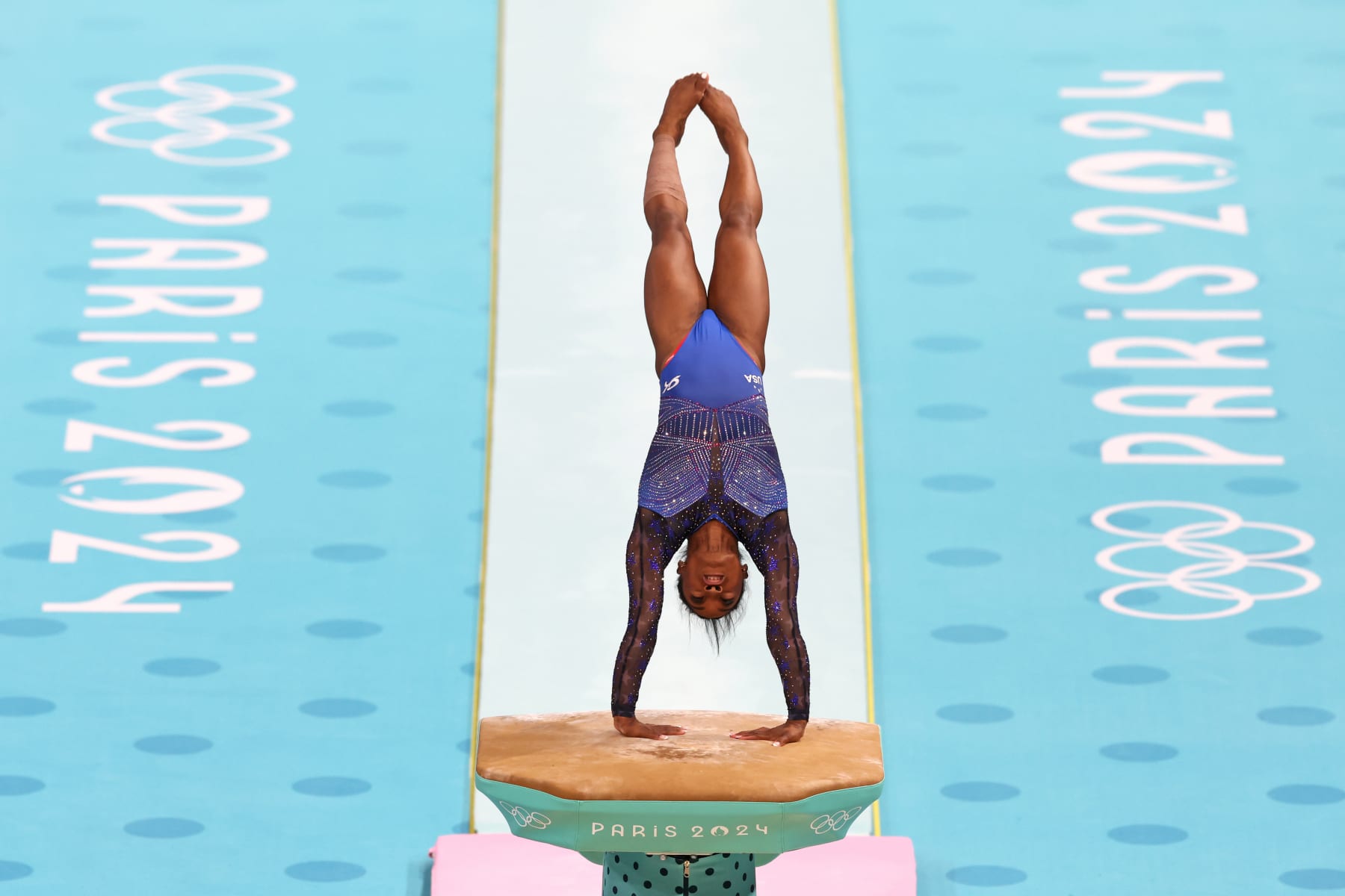 PARIS, FRANCE - AUGUST 01: Simone Biles of Team United States competes on the vault during the Artistic Gymnastics Women's All-Around Final on day six of the Olympic Games Paris 2024 at Bercy Arena on August 01, 2024 in Paris, France. (Photo by Christian Petersen/Getty Images)