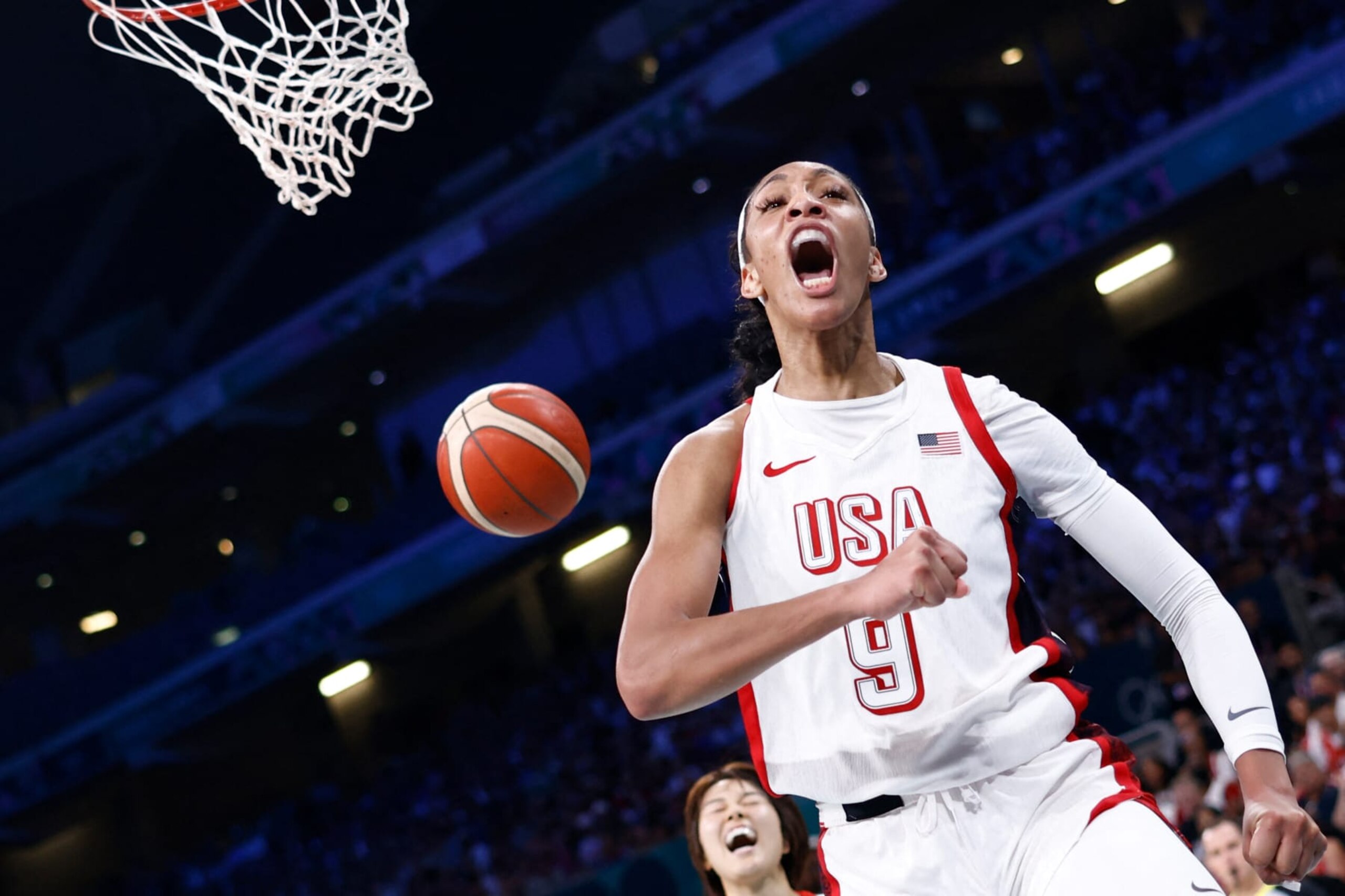 USA's #09 A'ja Wilson celebrates after scoring in the women's preliminary round group C basketball match between USA and Japan during the Paris 2024 Olympic Games at the Pierre-Mauroy stadium in Villeneuve-d'Ascq, northern France, on July 29, 2024. (Photo by Sameer Al-Doumy / AFP) (Photo by SAMEER AL-DOUMY/AFP via Getty Images) USA's #09 A'ja Wilson celebrates after scoring in the women's preliminary round group C basketball match between USA and Japan during the Paris 2024 Olympic Games at the Pierre-Mauroy stadium in Villeneuve-d'Ascq, northern France, on July 29, 2024. (Photo by Sameer Al-Doumy / AFP) (Photo by SAMEER AL-DOUMY/AFP via Getty Images)