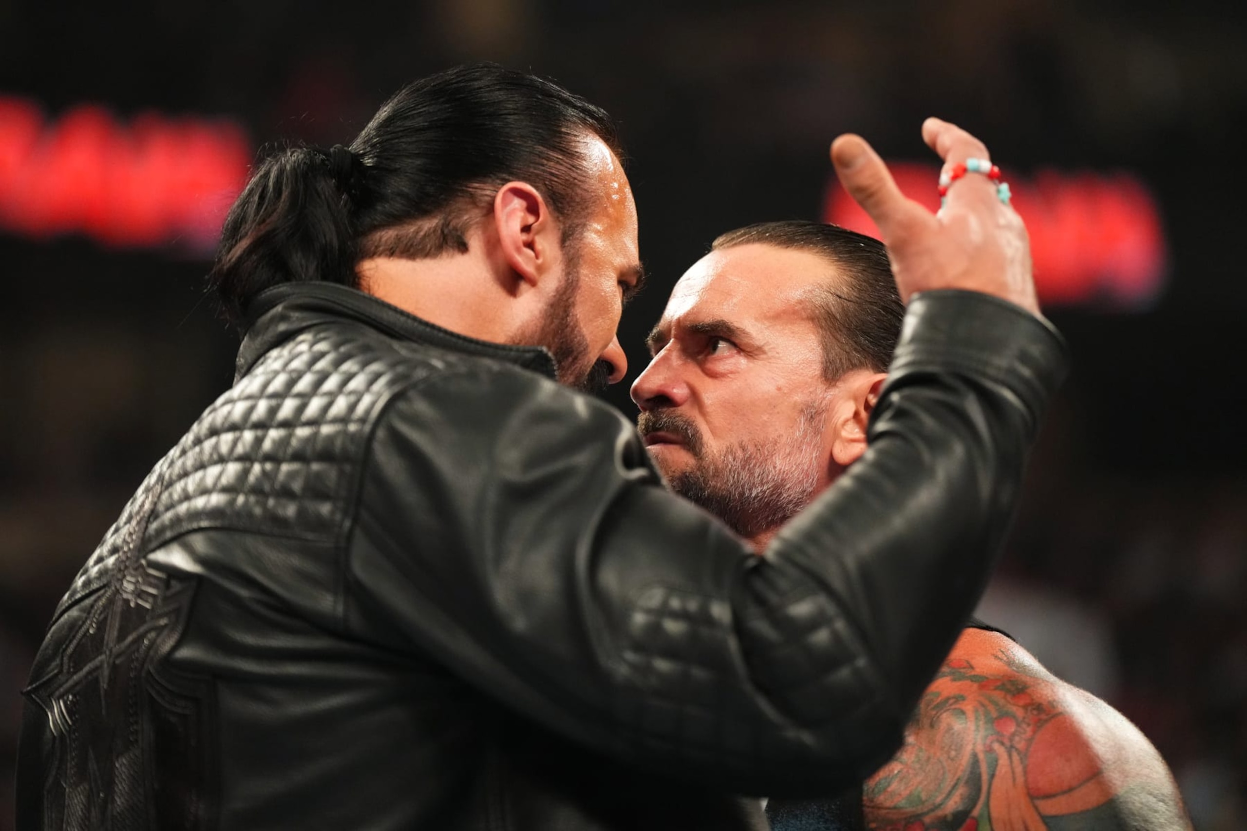 ST PAUL, MINNESOTA - JULY 29: (L-R) Drew McIntyre faces off in the ring with CM Punk during WWE's Monday Night RAW at Xcel Energy Center on July 29, 2024 in St Paul, Minnesota.  (Photo by WWE/Getty Images)