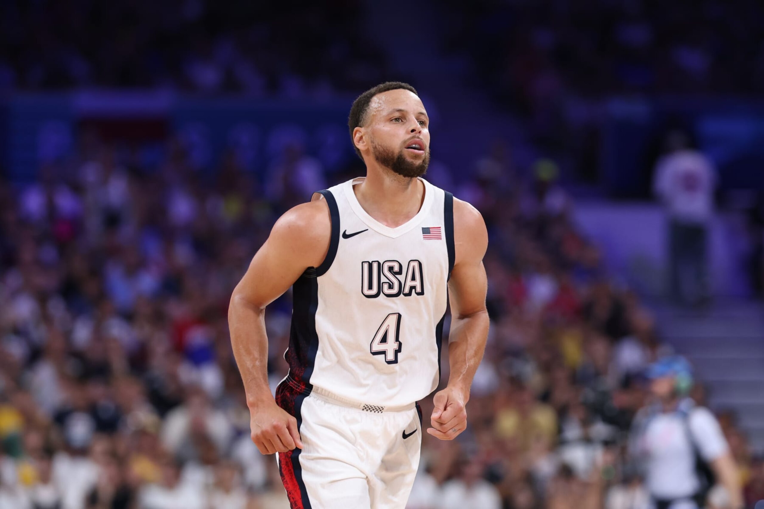 LILLE, FRANCE - JULY 31: Stephen Curry #4 of Team United States looks on during a Men's Group Phase - Group C game between the United States and South Sudan on day five of the Olympic Games Paris 2024 at Stade Pierre Mauroy on July 31, 2024 in Lille, France. (Photo by Gregory Shamus/Getty Images)