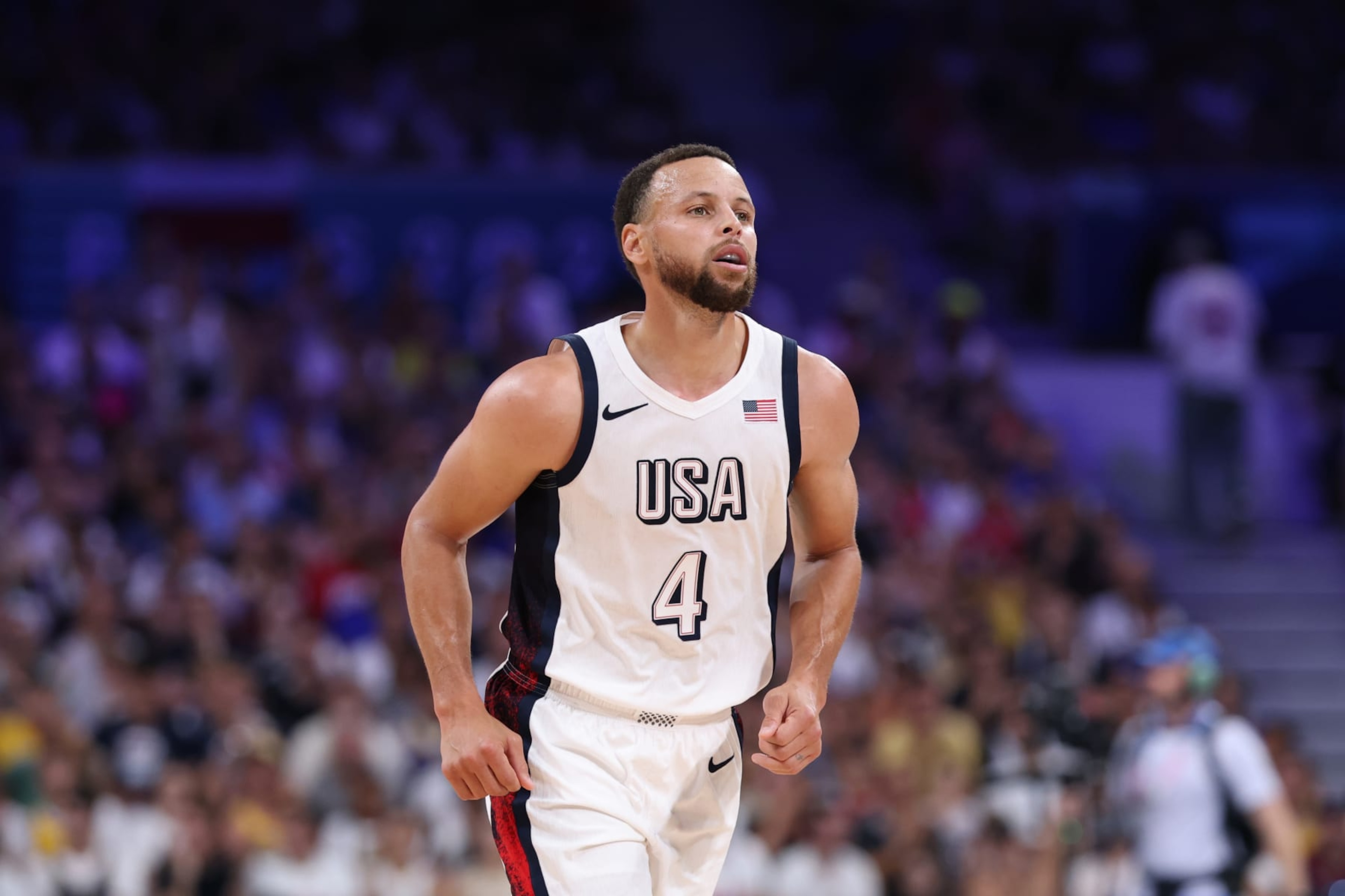 LILLE, FRANCE - JULY 31: Stephen Curry #4 of Team United States looks on during a Men's Group Phase - Group C game between the United States and South Sudan on day five of the Olympic Games Paris 2024 at Stade Pierre Mauroy on July 31, 2024 in Lille, France. (Photo by Gregory Shamus/Getty Images)