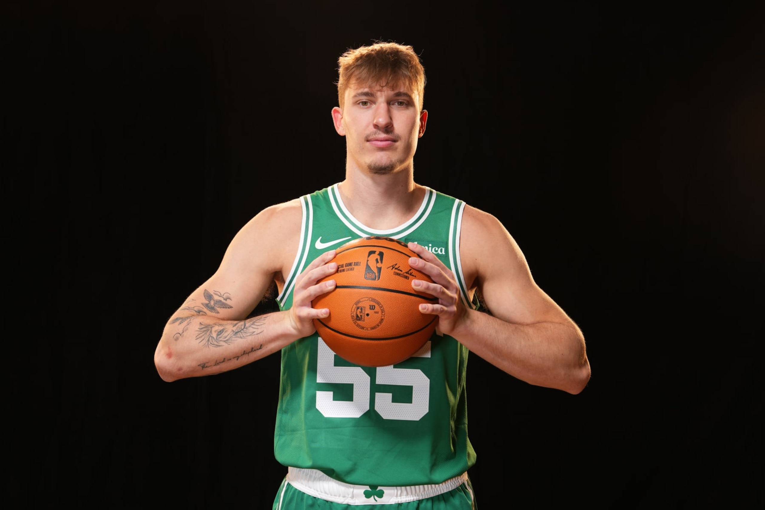 LAS VEGAS, NV - JULY 16: Baylor Scheierman #55 of the Boston Celtics poses for a portrait during the 2024 NBA Rookie Photo Shoot on July 16, 2024 at the University of Nevada, Las Vegas campus in Las Vegas, Nevada. NOTE TO USER: User expressly acknowledges and agrees that, by downloading and/or using this Photograph, user is consenting to the terms and conditions of the Getty Images License Agreement. Mandatory Copyright Notice: Copyright 2024 NBAE (Photo by Jeff Bottari/NBAE via Getty Images)