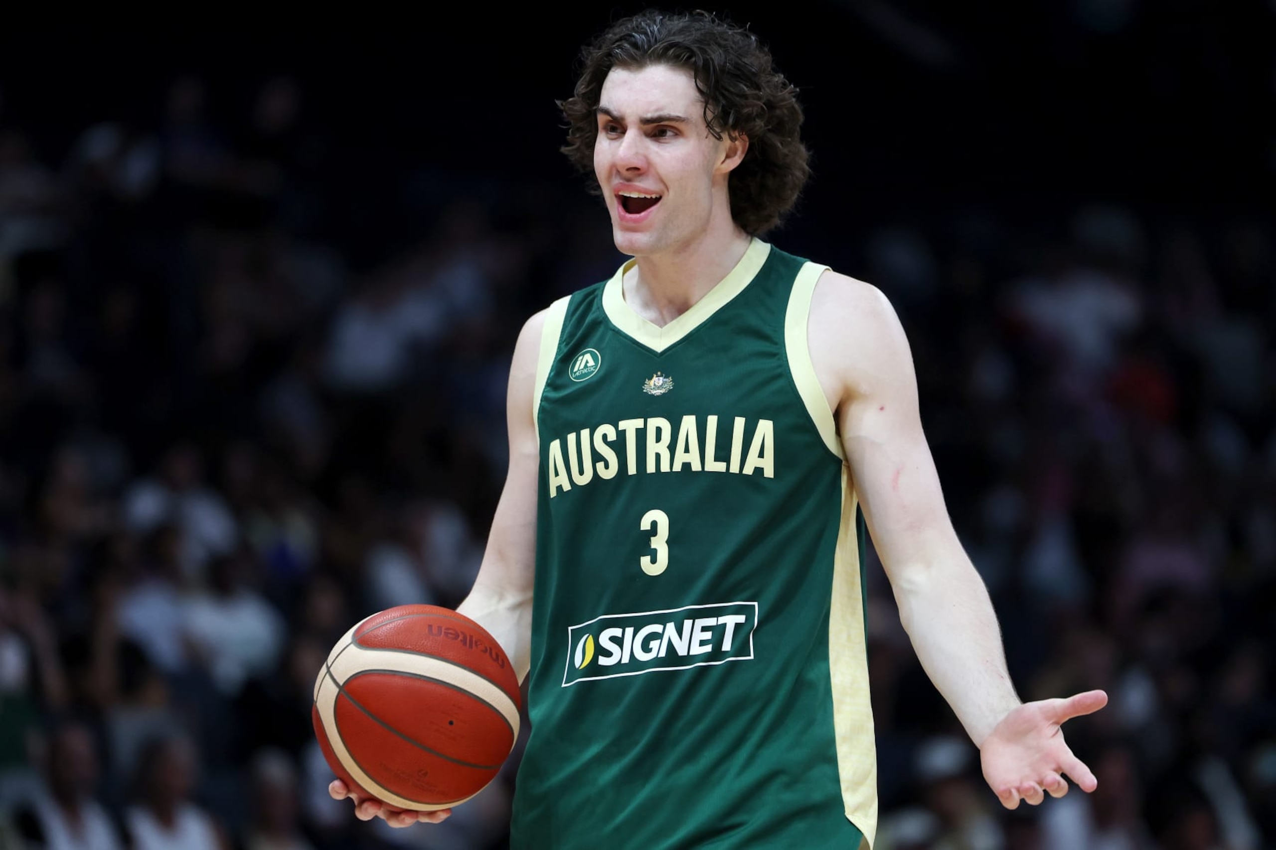 ABU DHABI, UNITED ARAB EMIRATES - JULY 16: Josh Giddey #3 of Australia reacts during the second half of an exhibition game between Australia and Serbia ahead of the Paris Olympic Games at Etihad Arena on July 16, 2024 in Abu Dhabi, United Arab Emirates. (Photo by Christopher Pike/Getty Images)