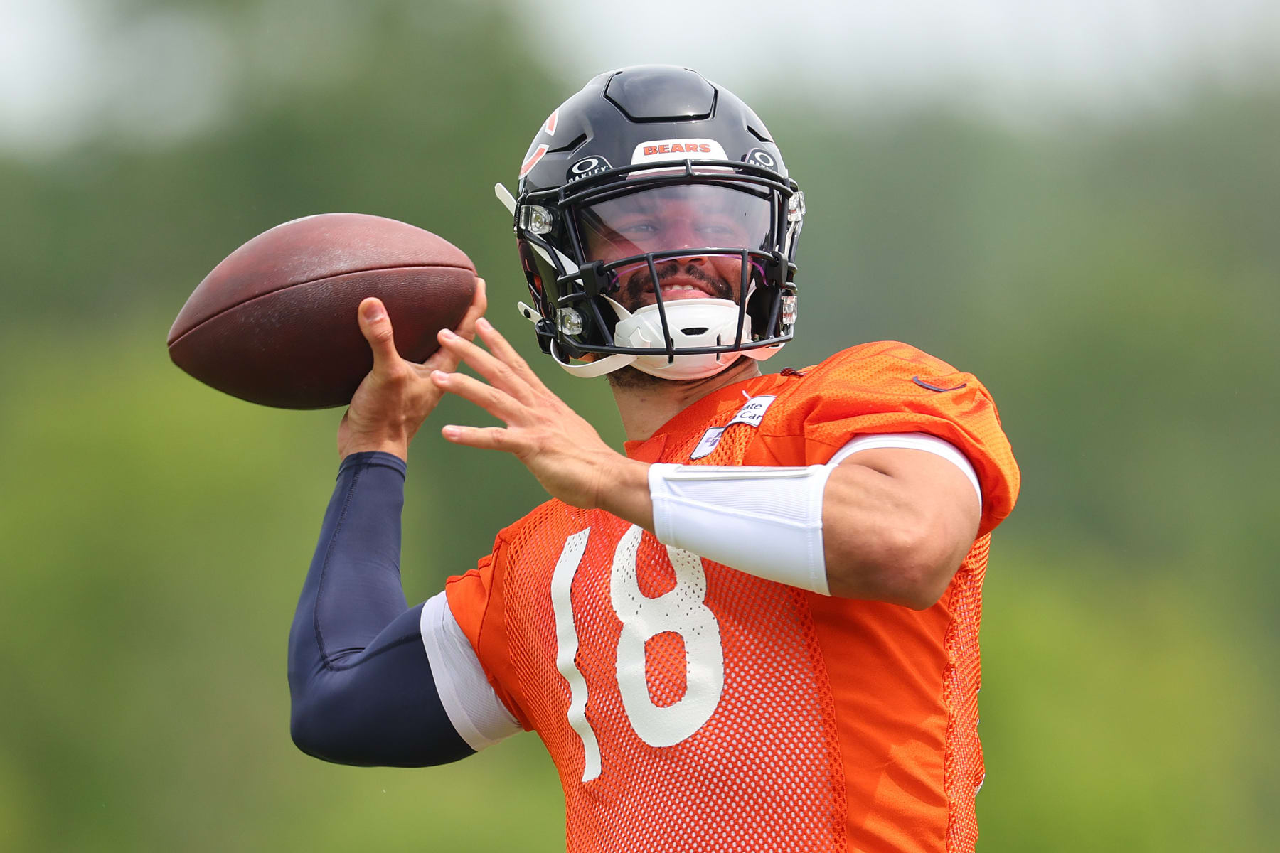 LAKE FOREST, ILLINOIS - JUNE 04: Caleb Williams #18 of the Chicago Bears throws a pass during Chicago Bears Minicamp at Halas Hall on June 04, 2024 in Lake Forest, Illinois. (Photo by Michael Reaves/Getty Images)