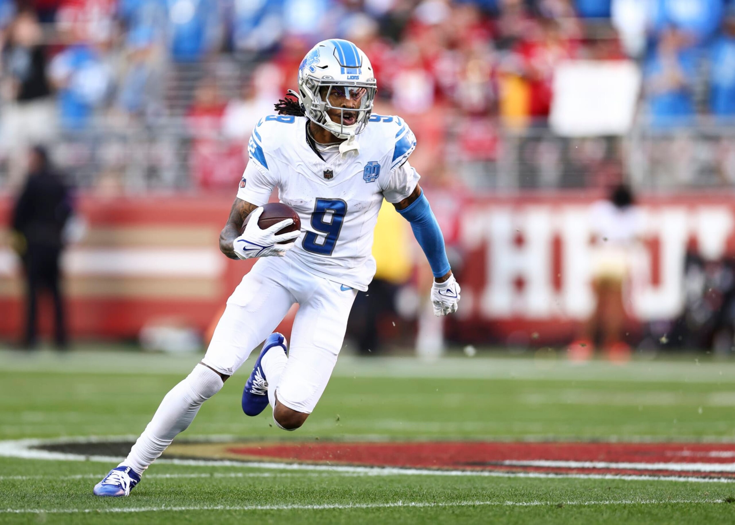 SANTA CLARA, CA - JANUARY 28: Jameson Williams #9 of the Detroit Lions carries the ball for a touchdown during the first quarter of the NFC Championship NFL football game against the San Francisco 49ers at Levi's Stadium on January 28, 2024 in Santa Clara, California. (Photo by Kevin Sabitus/Getty Images)