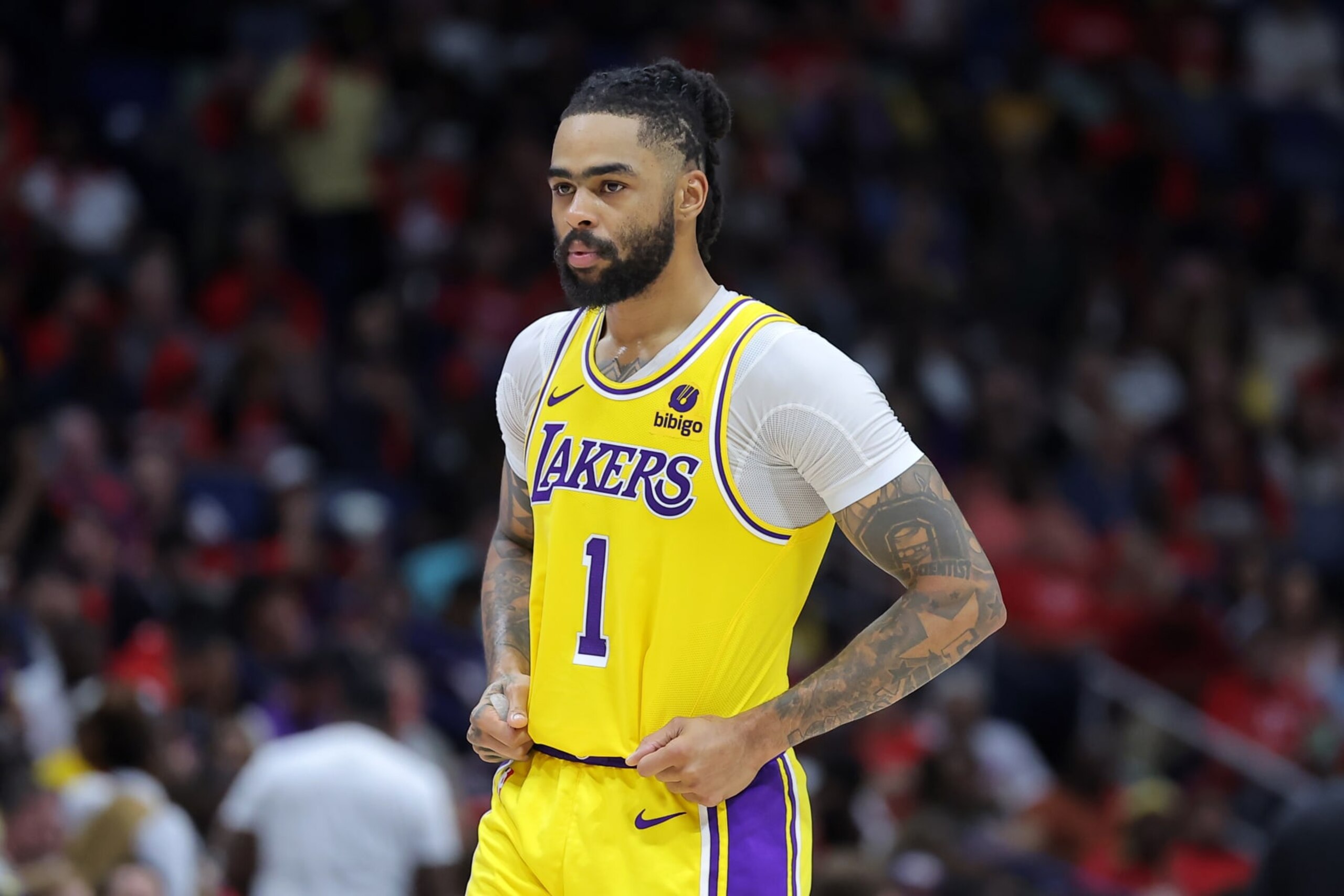 NEW ORLEANS, LOUISIANA - APRIL 16: D'Angelo Russell #1 of the Los Angeles Lakers reacts against the New Orleans Pelicans during a play-in tournament game at the Smoothie King Center on April 16, 2024 in New Orleans, Louisiana. NOTE TO USER: User expressly acknowledges and agrees that, by downloading and or using this Photograph, user is consenting to the terms and conditions of the Getty Images License Agreement. (Photo by Jonathan Bachman/Getty Images)