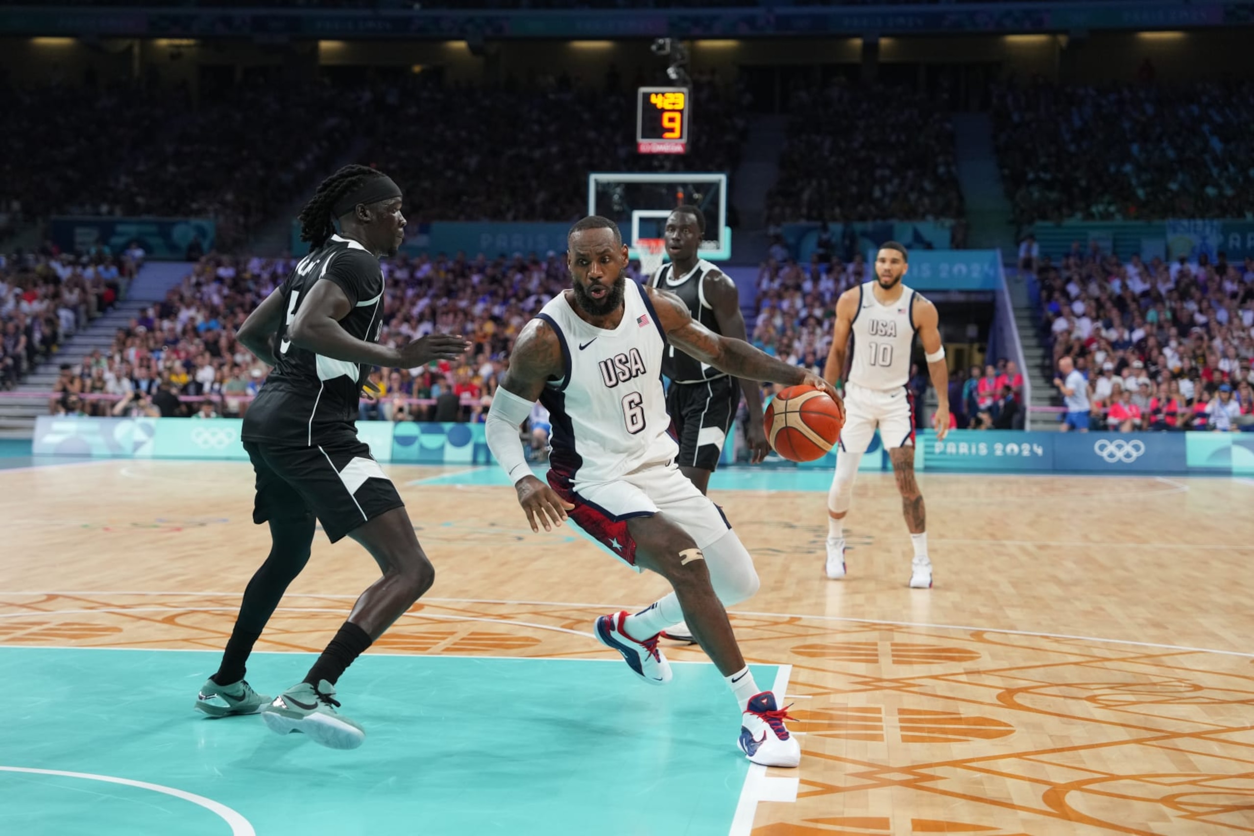 LILLE, FRANCE - JULY 31: LeBron James #6 of the USA Men's National Team handles the ball during the game on July 31, 2024 at the Stade Pierre Mauroy in Paris, France. NOTE TO USER: User expressly acknowledges and agrees that, by downloading and/or using this photograph, user is consenting to the terms and conditions of the Getty Images License Agreement. Mandatory Copyright Notice: Copyright 2024 NBAE (Photo by Jesse D. Garrabrant/NBAE via Getty Images)