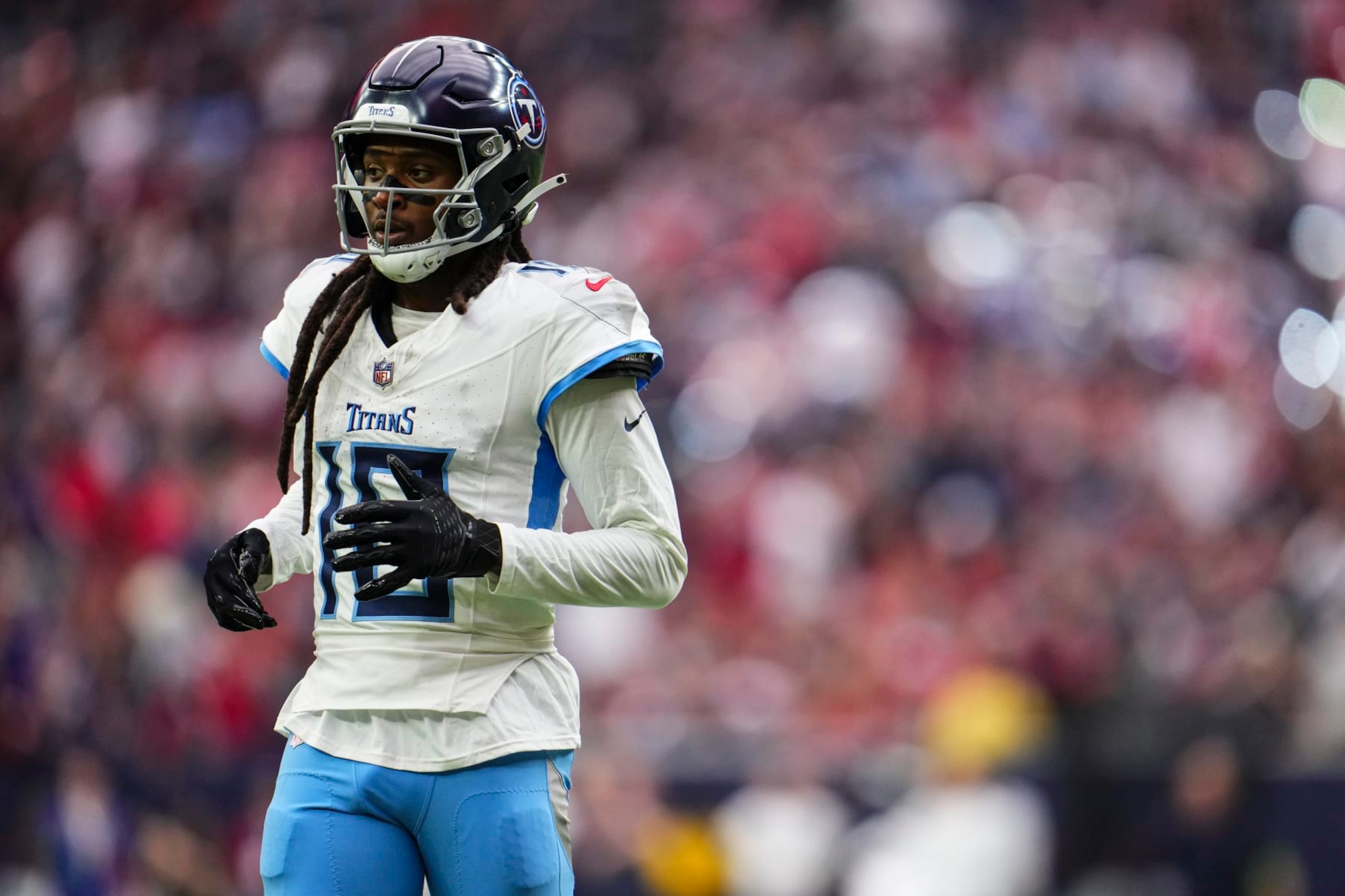 HOUSTON, TX - DECEMBER 31: DeAndre Hopkins #10 of the Tennessee Titans runs across the field during an NFL football game against the Houston Texans at NRG Stadium on December 31, 2023 in Houston, Texas. (Photo by Cooper Neill/Getty Images) HOUSTON, TX - DECEMBER 31: DeAndre Hopkins #10 of the Tennessee Titans runs across the field during an NFL football game against the Houston Texans at NRG Stadium on December 31, 2023 in Houston, Texas. (Photo by Cooper Neill/Getty Images)
