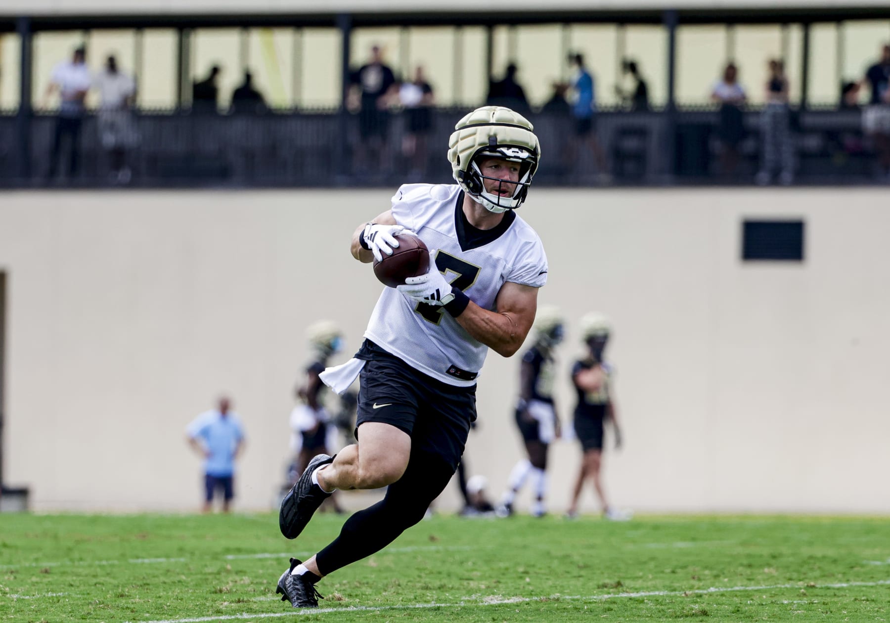 METAIRIE, LOUISIANA - JUNE 12: Taysom Hill #7 of the New Orleans Saints participates during mandatory minicamp at the New Orleans Saints Practice Facility on June 12, 2024 in Metaire, Louisiana. (Photo by Derick E. Hingle/Getty Images)