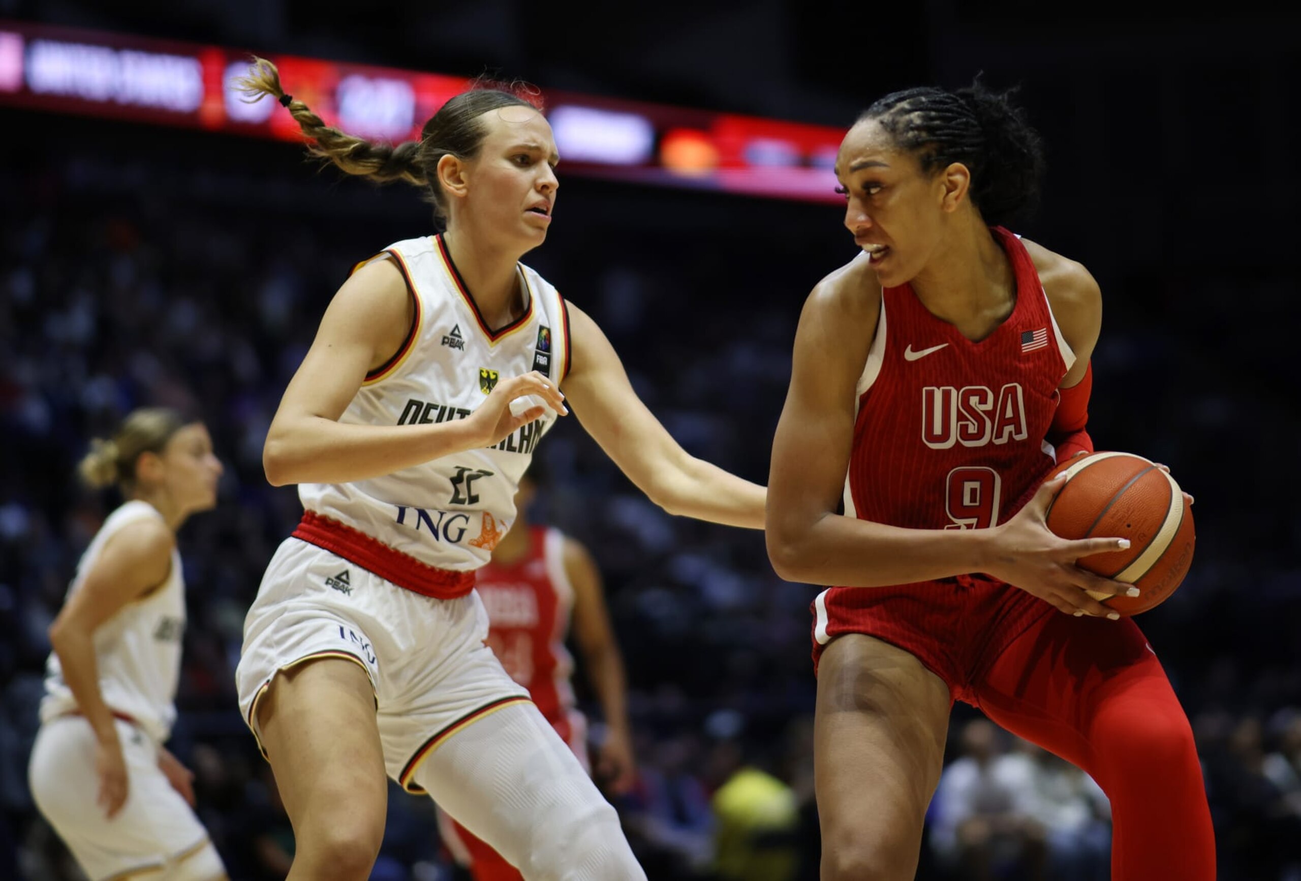 A'ja Wilson of The United States and Marie Gulich of Germany