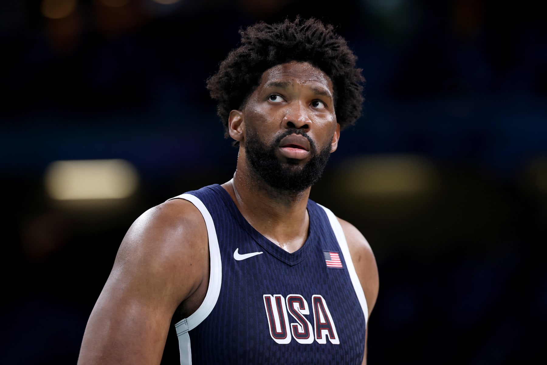 LILLE, FRANCE - AUGUST 03: Joel Embiid #11 of Team United States looks on during a Men's basketball group phase-group C game between the United States and Puerto Rico on day eight of the Olympic Games Paris 2024 at Stade Pierre Mauroy on August 03, 2024 in Lille, France. (Photo by Gregory Shamus/Getty Images)
