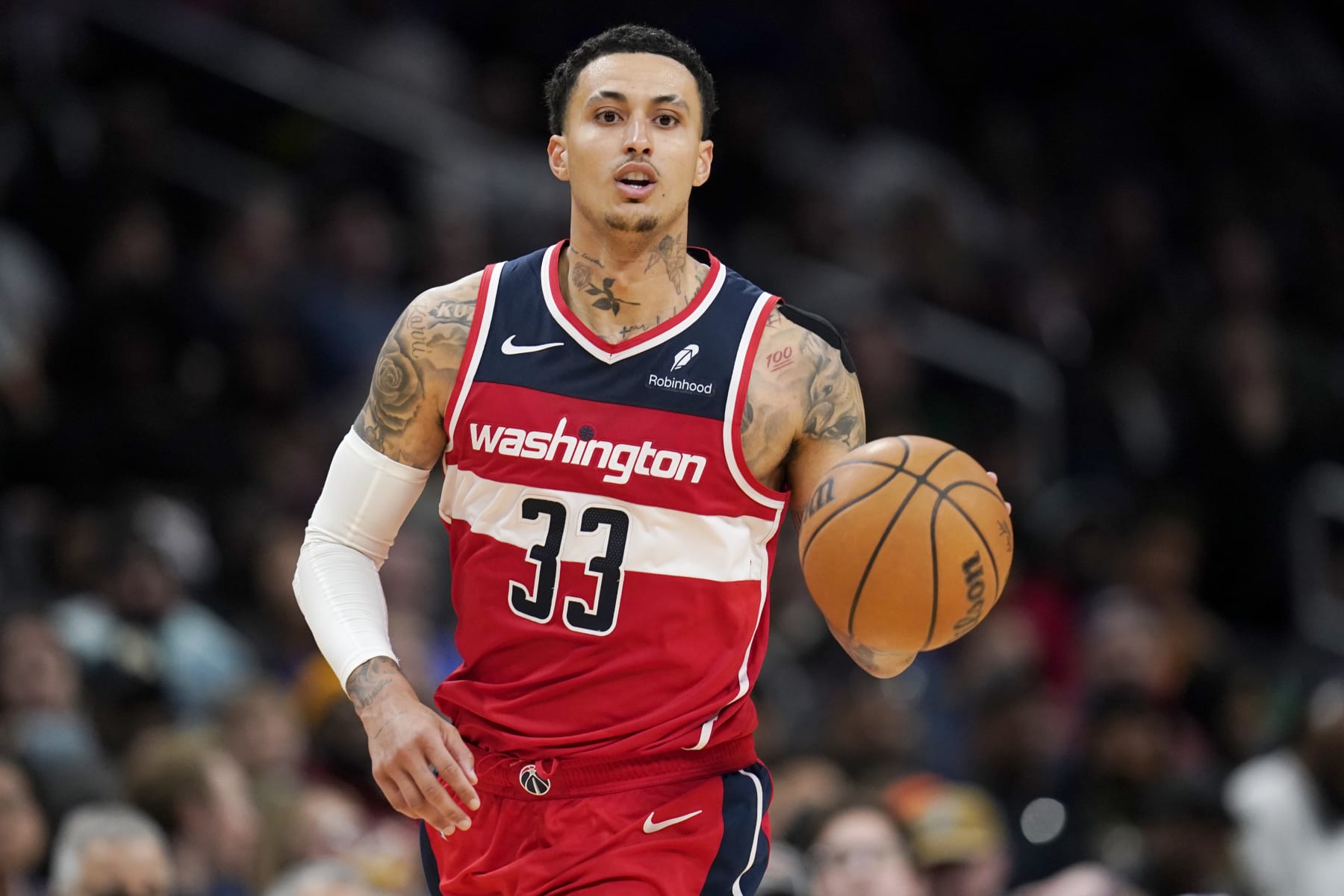 WASHINGTON, DC - MARCH 29: Kyle Kuzma #33 of the Washington Wizards dribbles the ball down the court during the second half against the Detroit Pistons at Capital One Arena on March 29, 2024 in Washington, DC. NOTE TO USER: User expressly acknowledges and agrees that, by downloading and or using this photograph, User is consenting to the terms and conditions of the Getty Images License Agreement. (Photo by Jess Rapfogel/Getty Images)