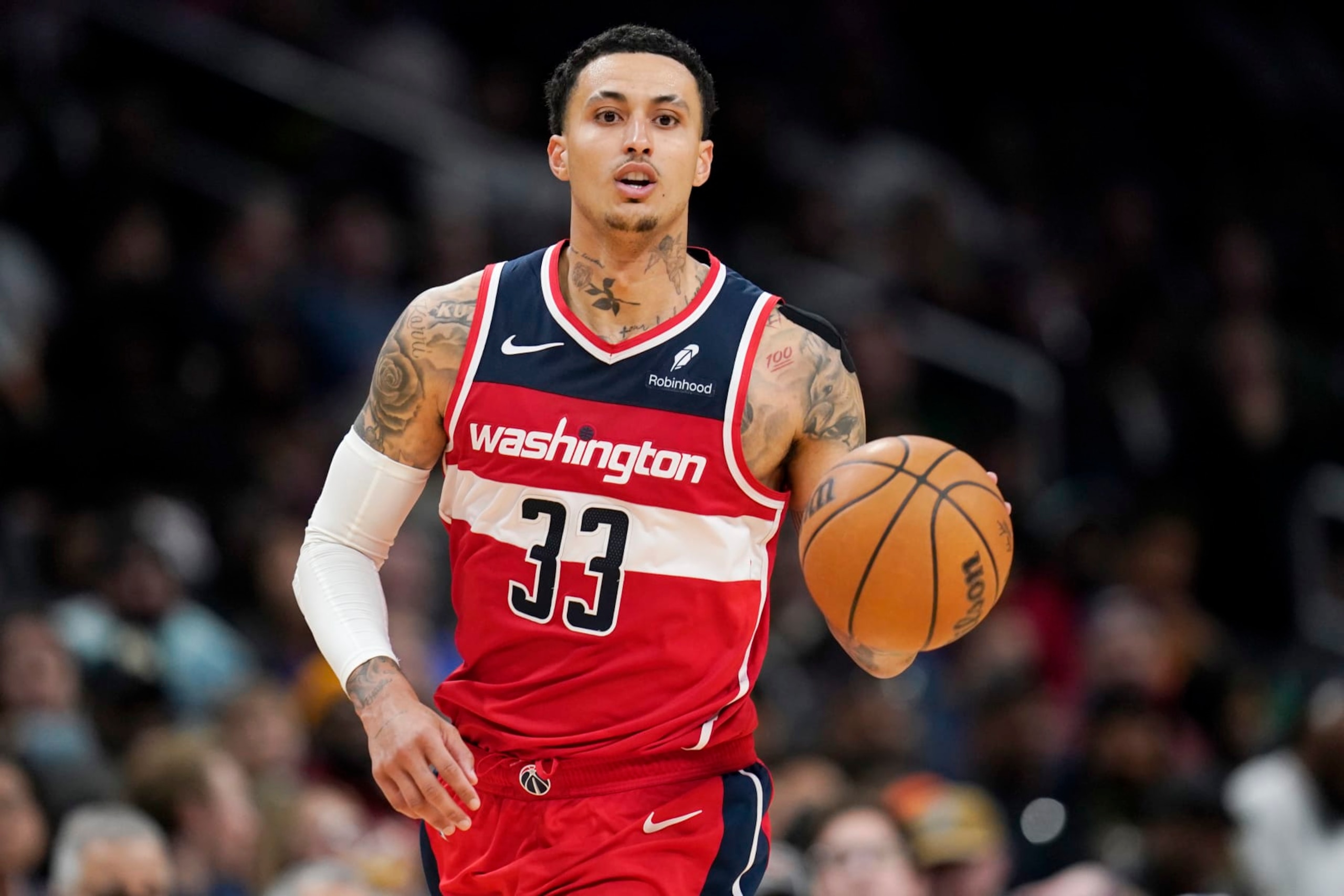WASHINGTON, DC - MARCH 29: Kyle Kuzma #33 of the Washington Wizards dribbles the ball down the court during the second half against the Detroit Pistons at Capital One Arena on March 29, 2024 in Washington, DC. NOTE TO USER: User expressly acknowledges and agrees that, by downloading and or using this photograph, User is consenting to the terms and conditions of the Getty Images License Agreement. (Photo by Jess Rapfogel/Getty Images)