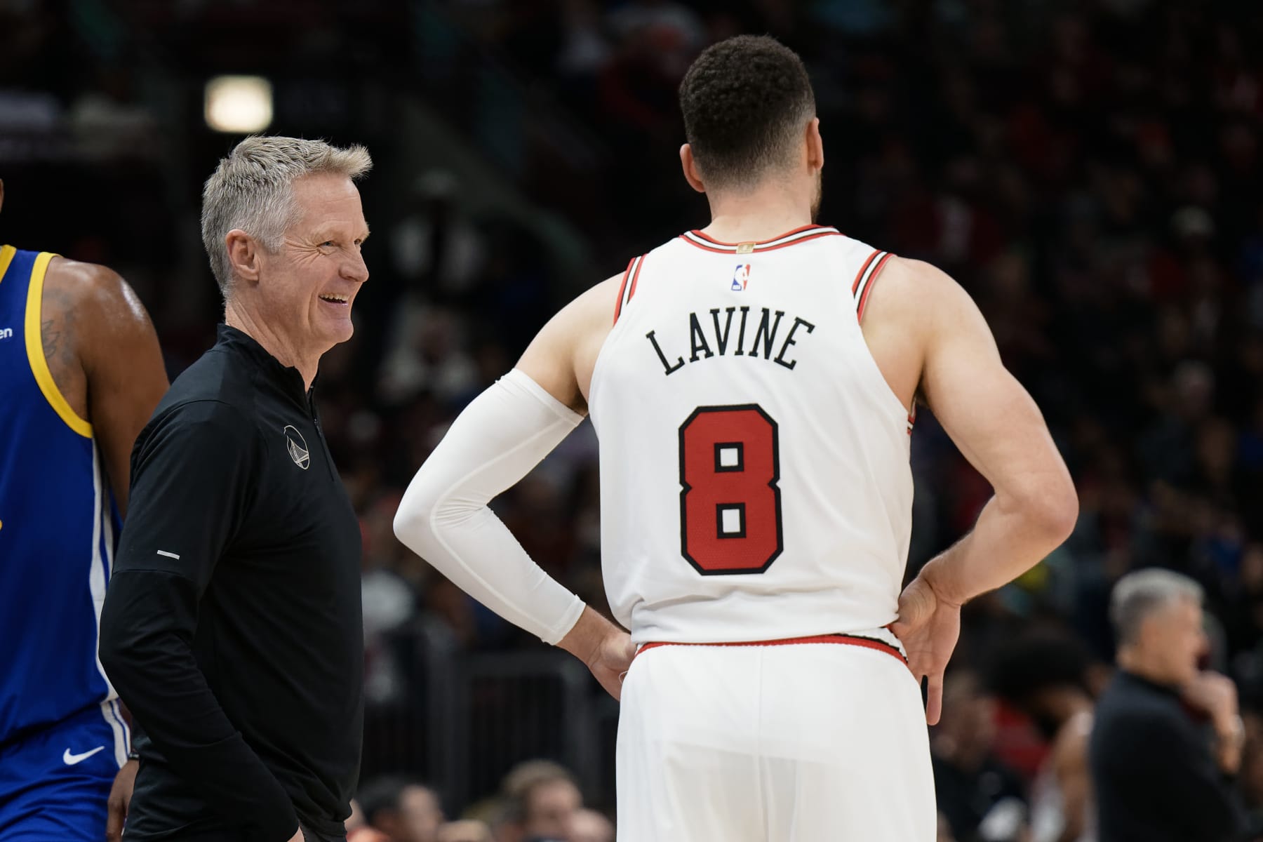 CHICAGO, ILLINOIS - JANUARY 12:  Head Coach Steve Kerr of the Golden State Warriors talks with Zach Lavine #8 of the Chicago Bulls on January 12, 2024 at United Center in Chicago, Illinois.   NOTE TO USER: User expressly acknowledges and agrees that, by downloading and or using this photograph, User is consenting to the terms and conditions of the Getty Images License Agreement.  (Photo by Jamie Sabau/Getty Images)