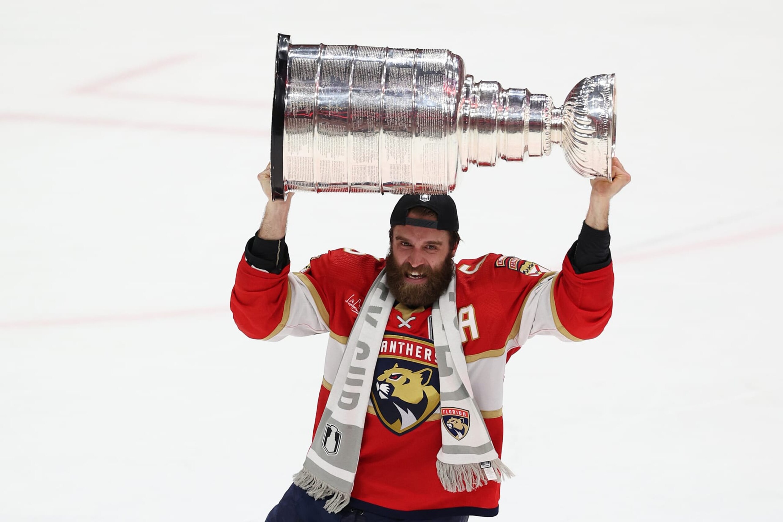SUNRISE, FLORIDA - JUNE 24: Aaron Ekblad #5 of the Florida Panthers celebrates with the Stanley Cup after Florida's 2-1 victory against the Edmonton Oilers in Game Seven of the 2024 Stanley Cup Final at Amerant Bank Arena on June 24, 2024 in Sunrise, Florida. (Photo by Elsa/Getty Images)