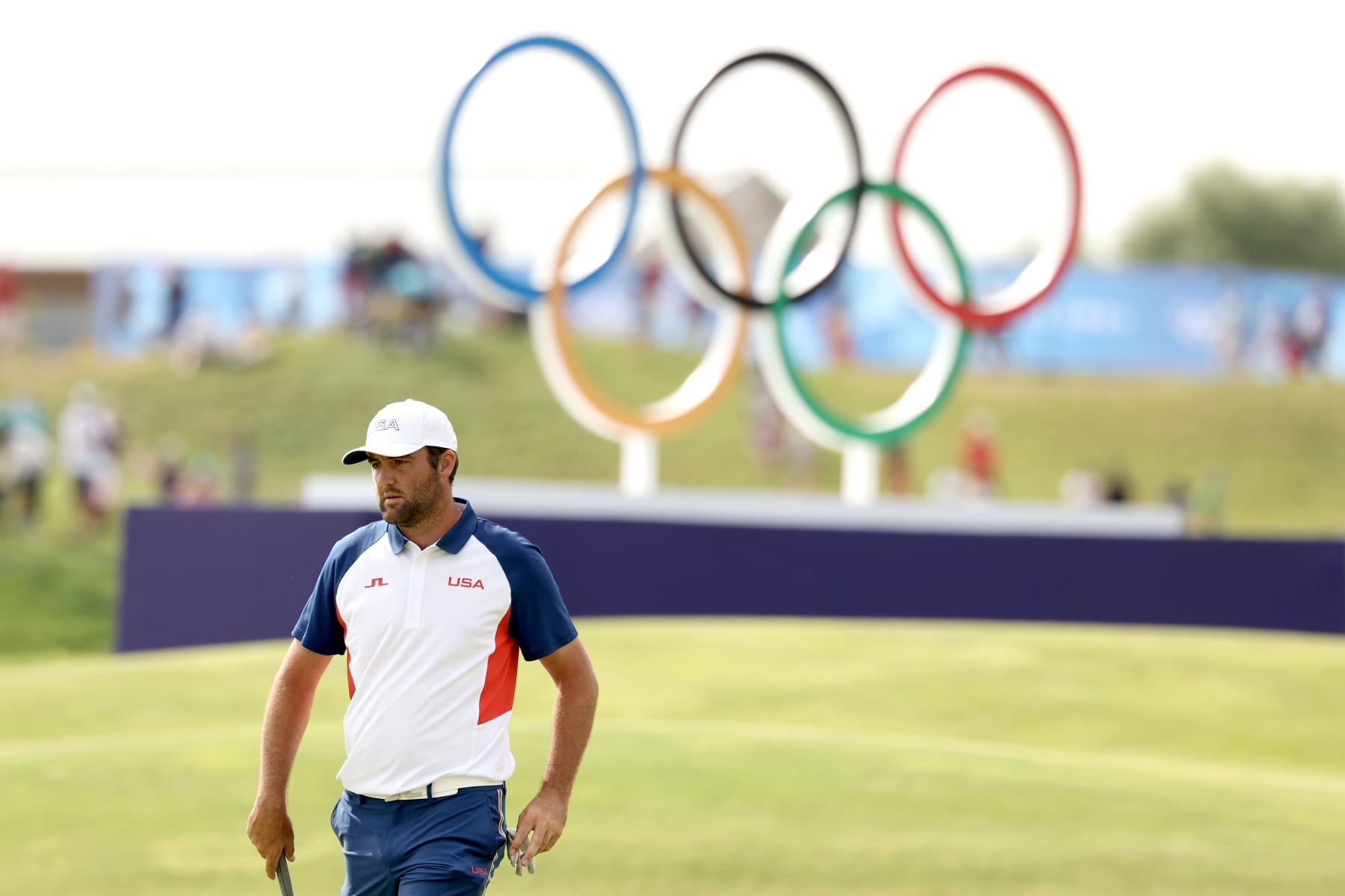 PARIS, FRANCE - AUGUST 04: Scottie Scheffler of Team United States walks on the 18th green during Day Four of the Men's Individual Stroke Play on day nine of the Olympic Games Paris 2024 at Le Golf National on August 04, 2024 in Paris, France. (Photo by Kevin C. Cox/Getty Images)