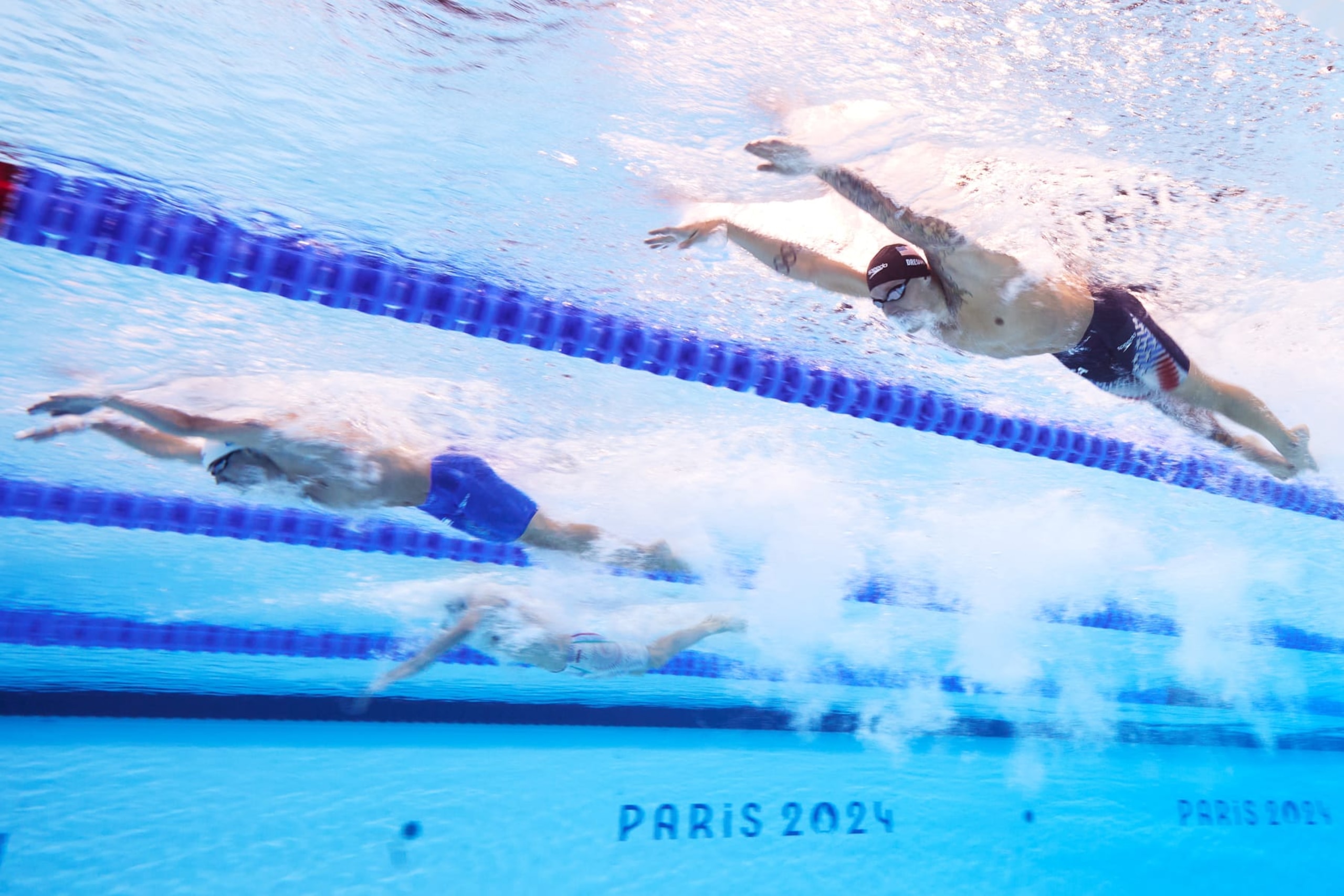 NANTERRE, FRANCE - AUGUST 02: (EDITORS NOTE: Image was captured using an underwater robotic camera.) Caeleb Dressel of Team United States competes in the Men's 100m Butterfly Semifinals on day seven of the Olympic Games Paris 2024 at Paris La Defense Arena on August 02, 2024 in Nanterre, France. (Photo by Adam Pretty/Getty Images) NANTERRE, FRANCE - AUGUST 02: (EDITORS NOTE: Image was captured using an underwater robotic camera.) Caeleb Dressel of Team United States competes in the Men's 100m Butterfly Semifinals on day seven of the Olympic Games Paris 2024 at Paris La Defense Arena on August 02, 2024 in Nanterre, France. (Photo by Adam Pretty/Getty Images)