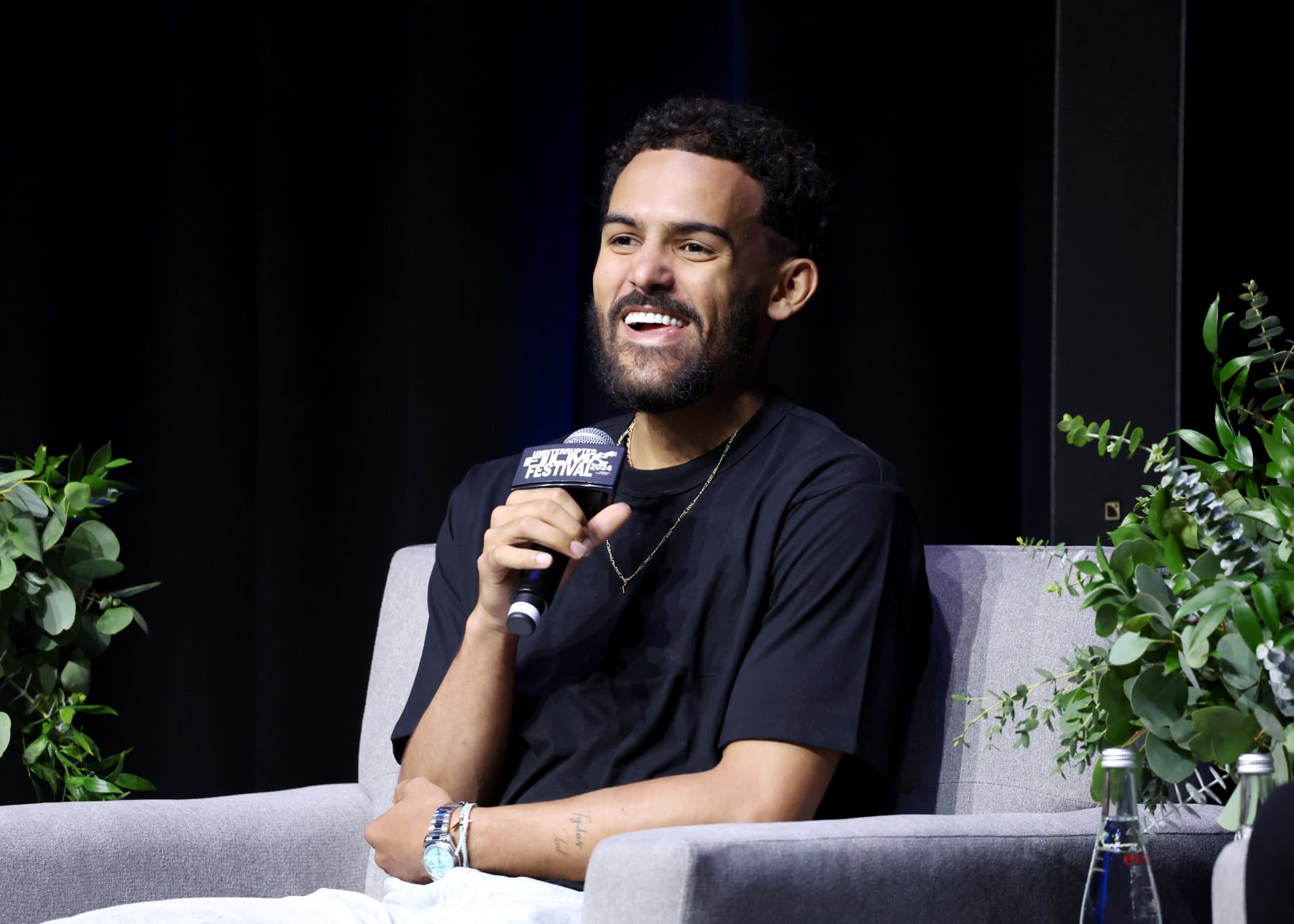HOLLYWOOD, CALIFORNIA - JULY 10: Trae Young speaks onstage during the "A Conversation With Matt Barnes on Athlete Storytelling & Entertainment" panel at Uninterrupted Film Festival 2024 Powered by Tribeca Festival at NeueHouse Hollywood on July 10, 2024 in Hollywood, California. (Photo by Phillip Faraone/Getty Images for Uninterrupted, LLC)