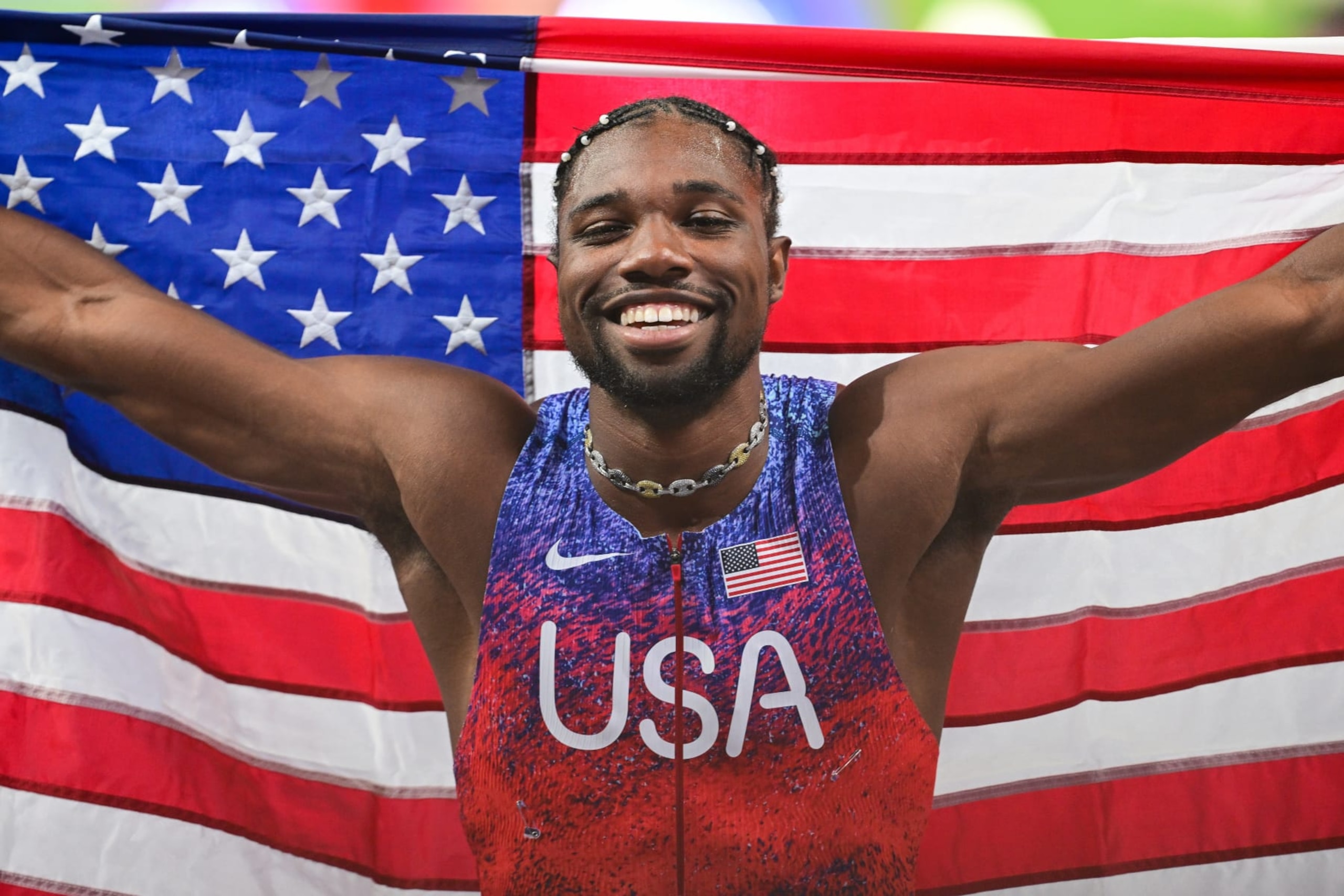SAINT-DENIS, FRANCE - AUGUST 04: US' Noah Lyles celebrates after winning the men's 100m final of the athletics event at the Paris 2024 Olympic Games at Stade de France in Saint-Denis, north of Paris, on August 4, 2024. (Photo by Mehmet Murat Onel/Anadolu via Getty Images) SAINT-DENIS, FRANCE - AUGUST 04: US' Noah Lyles celebrates after winning the men's 100m final of the athletics event at the Paris 2024 Olympic Games at Stade de France in Saint-Denis, north of Paris, on August 4, 2024. (Photo by Mehmet Murat Onel/Anadolu via Getty Images)