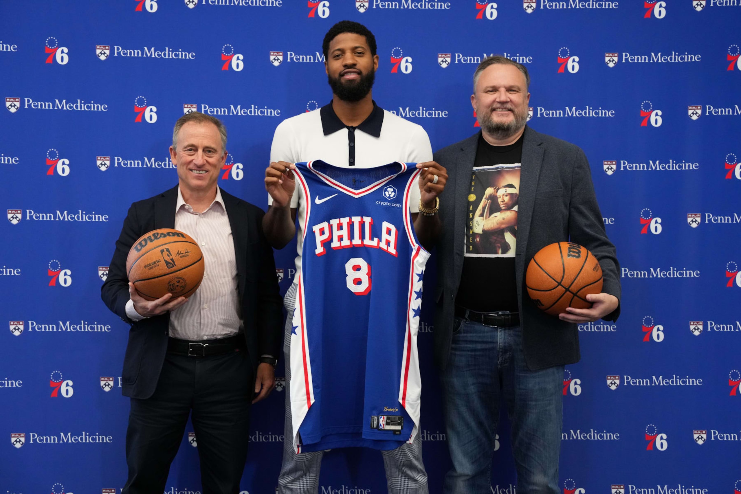 PHILADELPHIA, PA - JULY 23: Josh Harris, Paul George #8 of the Philadelphia 76ers, and Daryl Morey pose for a photo during his Philadelphia 76ers introductory press conference on July 23, 2024 at the Wells Fargo Center in Philadelphia, Pennsylvania NOTE TO USER: User expressly acknowledges and agrees that, by downloading and/or using this Photograph, user is consenting to the terms and conditions of the Getty Images License Agreement. Mandatory Copyright Notice: Copyright 2024 NBAE (Photo by Jesse D. Garrabrant/NBAE via Getty Images)