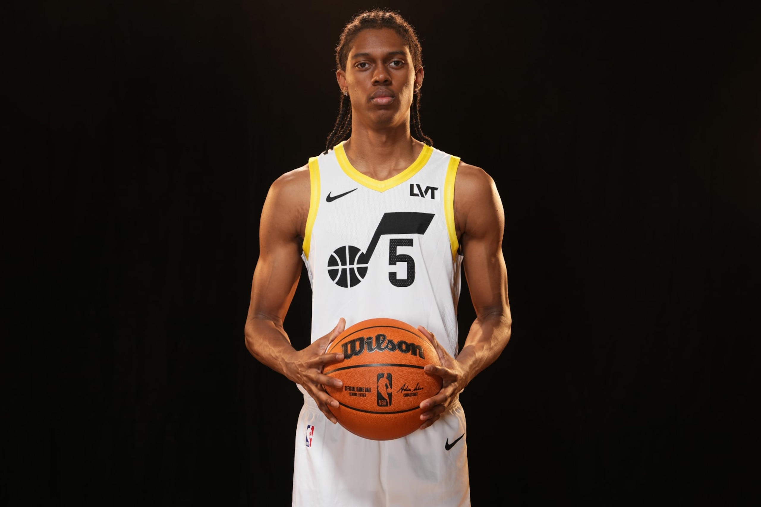LAS VEGAS, NV - JULY 16: Cody Williams #5 of the Utah Jazz poses for a portrait during the 2024 NBA Rookie Photo Shoot on July 16, 2024 at the University of Nevada, Las Vegas campus in Las Vegas, Nevada. NOTE TO USER: User expressly acknowledges and agrees that, by downloading and/or using this Photograph, user is consenting to the terms and conditions of the Getty Images License Agreement. Mandatory Copyright Notice: Copyright 2024 NBAE (Photo by Jeff Bottari/NBAE via Getty Images)
