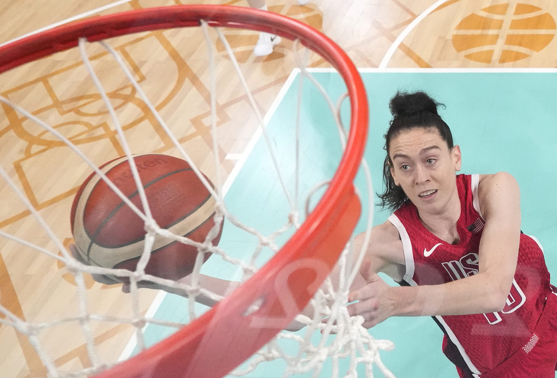 LILLE, FRANCE - AUGUST 04: (EDITORS NOTE: Image was captured using a remote camera positioned above the field of play) Breanna Stewart #10 of Team United States goes up for a basket during a Women's basketball Group Phase - Group  C game between the United States and Germany on day nine of the Olympic Games Paris 2024 at Stade Pierre Mauroy on August 04, 2024 in Lille, France. (Photo by Pool/Getty Images)