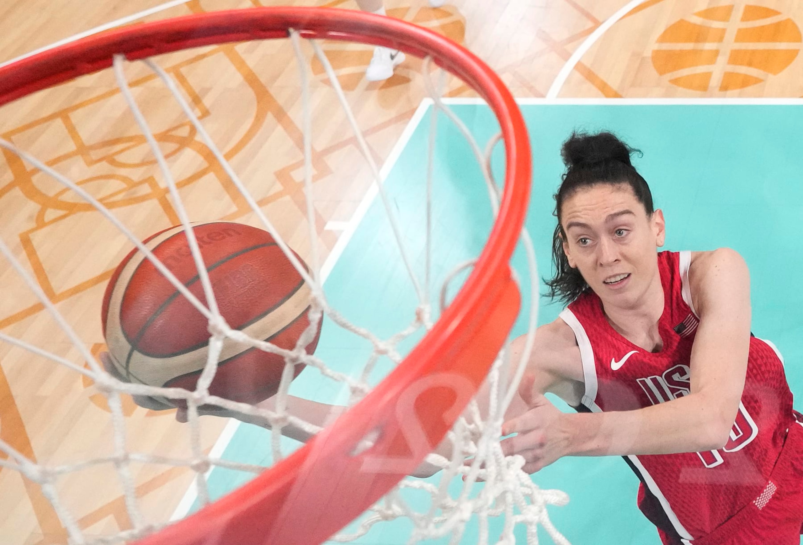 LILLE, FRANCE - AUGUST 04: (EDITORS NOTE: Image was captured using a remote camera positioned above the field of play) Breanna Stewart #10 of Team United States goes up for a basket during a Women's basketball Group Phase - Group  C game between the United States and Germany on day nine of the Olympic Games Paris 2024 at Stade Pierre Mauroy on August 04, 2024 in Lille, France. (Photo by Pool/Getty Images)